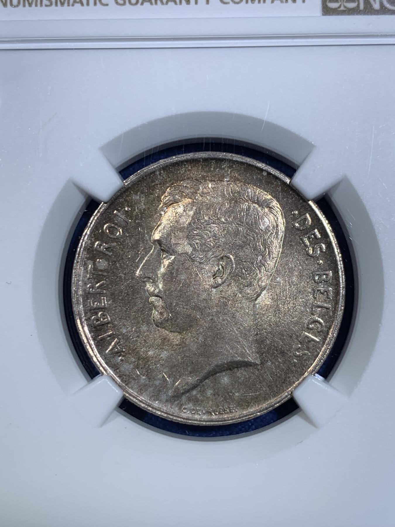 《竞宝斋》第297场- 周日，周一  2场连拍 （全场包邮） NGC MS63 比利时1911年 埃尔佩托 流通2法郎银币，绚丽环彩包浆，顶级状态。只发行了2年的品种，流通充分，更高分仅有4枚