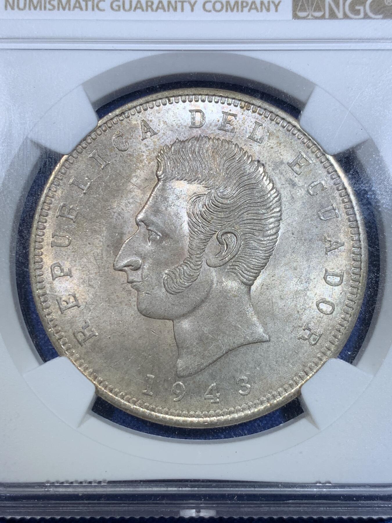 《竞宝斋》第297场- 周日，周一  2场连拍 （全场包邮） NGC MS64 厄瓜多尔1943年五苏克雷银币，墨西哥代铸，流通较充分，高分难得！漂亮的黄油光状态。