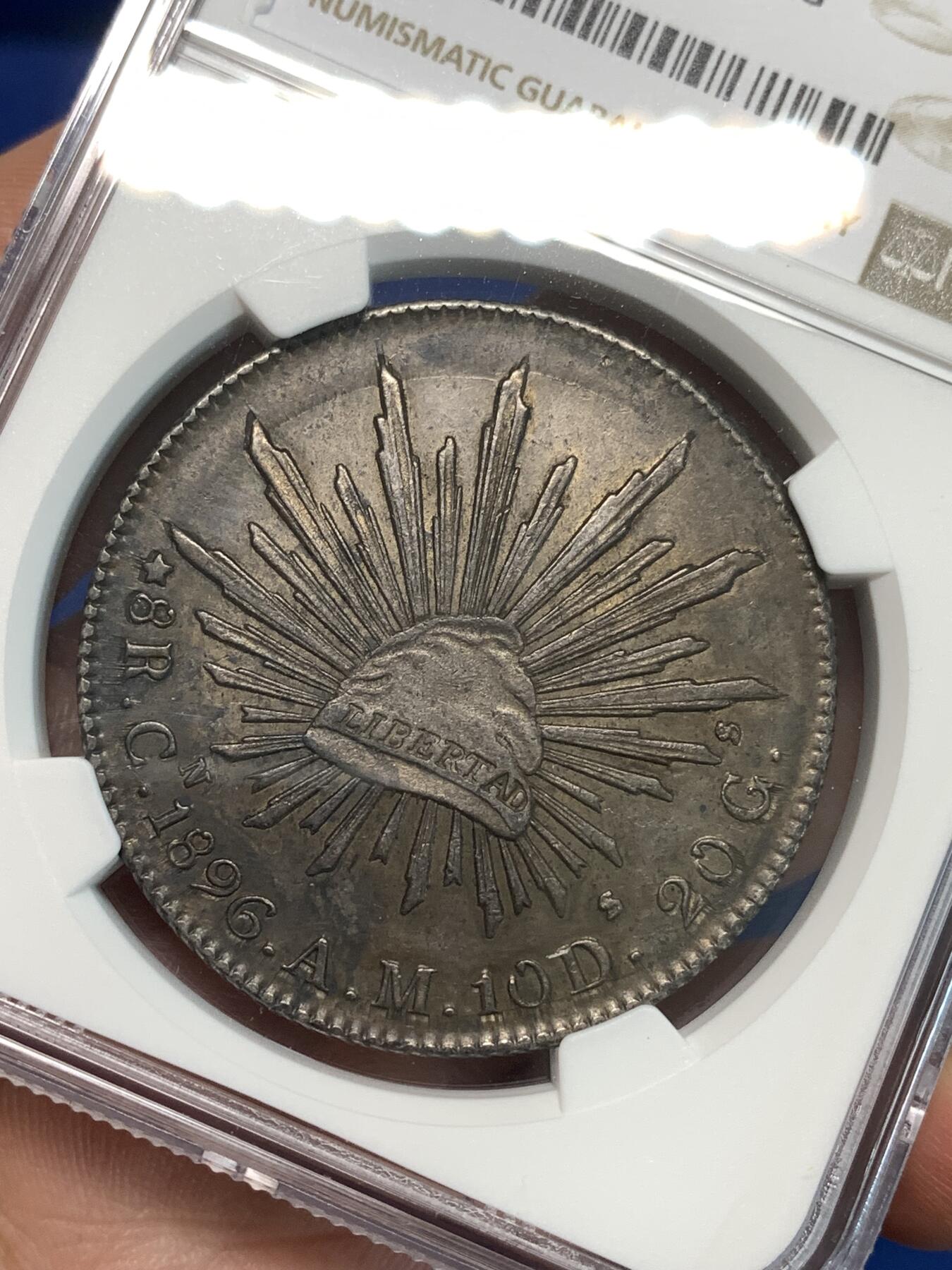 《竞宝斋》第297场- 周日，周一  2场连拍 （全场包邮） NGC AUD 1896年墨西哥鹰洋银币 五彩炫黑老包浆，味道极好，NGC错杀，厂标也很少见