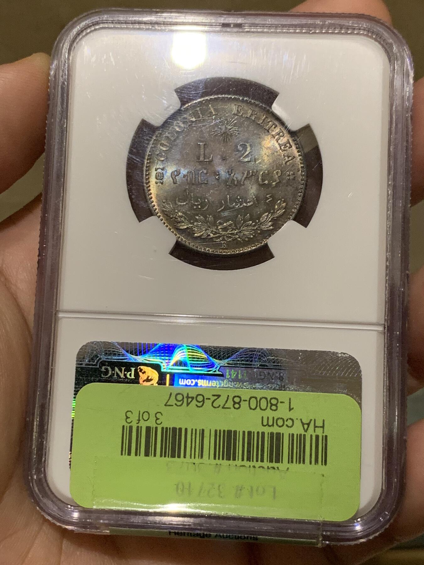 《竞宝斋》第297场- 周日，周一  2场连拍 （全场包邮） NGC 3枚一组 意属厄立特里亚 1890 50C，1里拉，2里拉辅币一套。最顶级的状态，著名的Millenia旧藏。50c的63分，1里拉64分，2里拉65分。包浆一致，绚丽五彩。附上最近这三个品种的价格，1里拉还是62分的，三枚一共要两万六千多人民币。