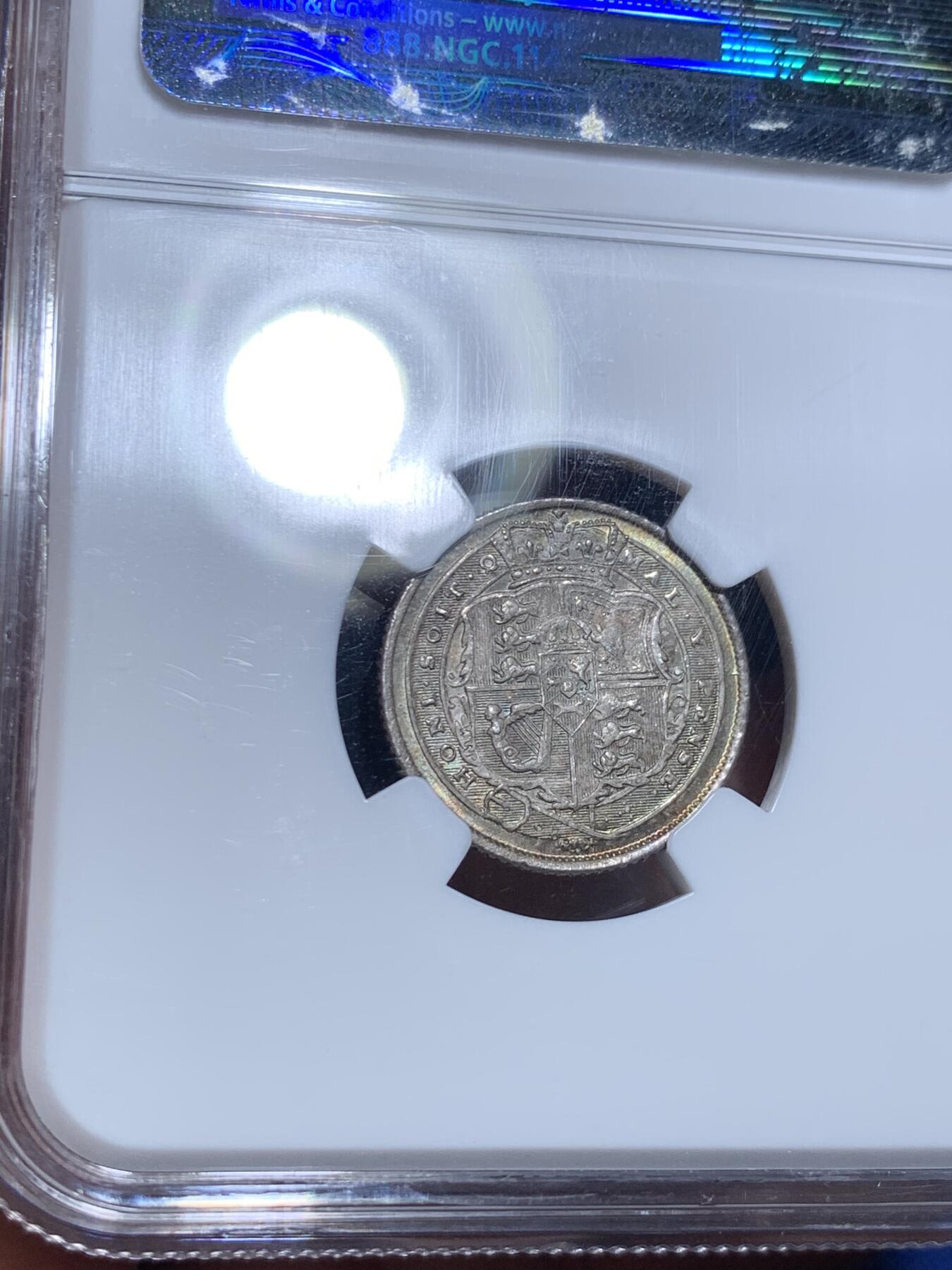 《竞宝斋》第297场- 周日，周一  2场连拍 （全场包邮） NGC MS65 1817年英国乔三牛头6便士银币，乔治三世。正面爆炸绚烂五彩，背面欧陆灰包浆。65收藏级高分，老N盒品质保障