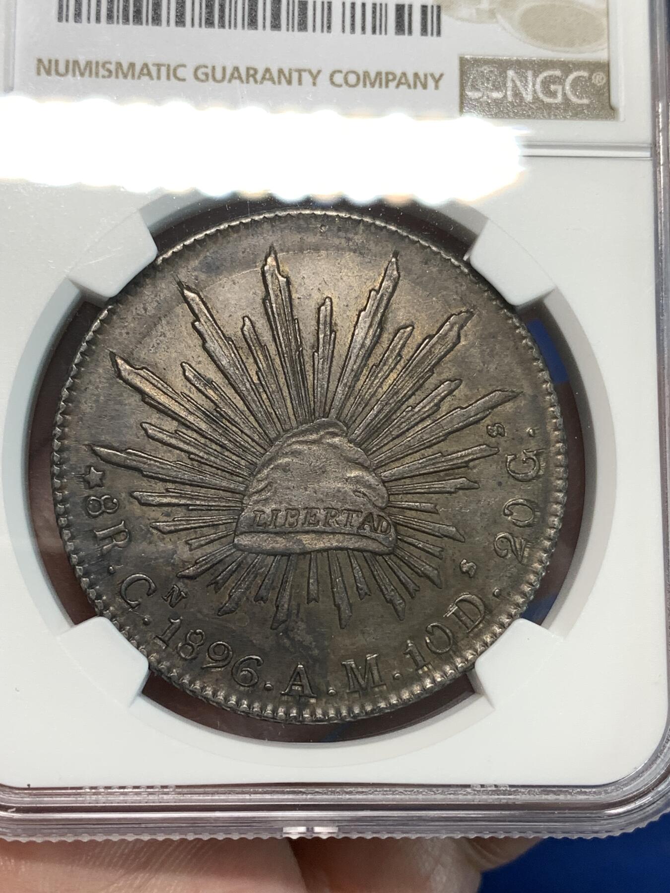 《竞宝斋》第297场- 周日，周一  2场连拍 （全场包邮） NGC AUD 1896年墨西哥鹰洋银币 五彩炫黑老包浆，味道极好，NGC错杀，厂标也很少见
