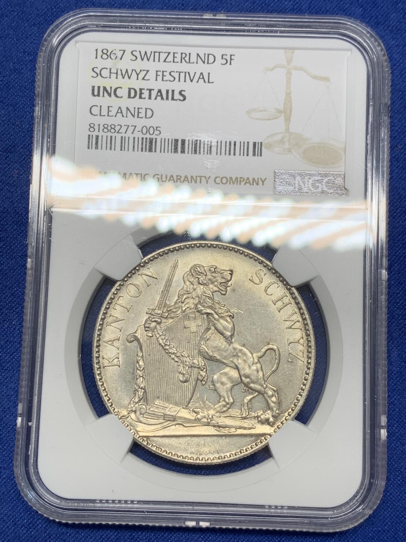 《竞宝斋》第297场- 周日，周一  2场连拍 （全场包邮） NGC UNC 瑞士1867年施维茨射击节5法郎银币 发行量8000枚 底板和光感都不错，可以试试砸盒养养包浆