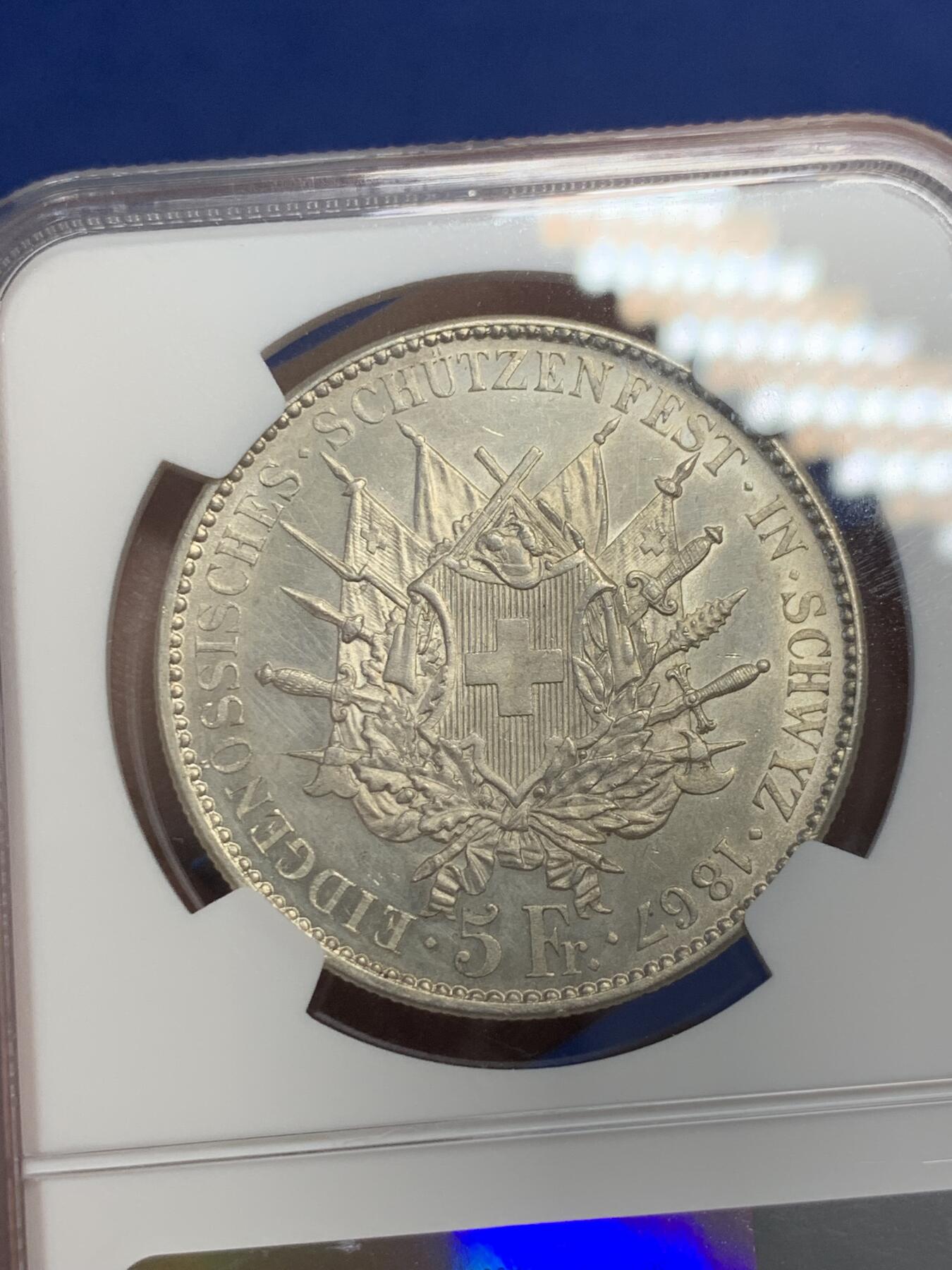 《竞宝斋》第297场- 周日，周一  2场连拍 （全场包邮） NGC UNC 瑞士1867年施维茨射击节5法郎银币 发行量8000枚 底板和光感都不错，可以试试砸盒养养包浆