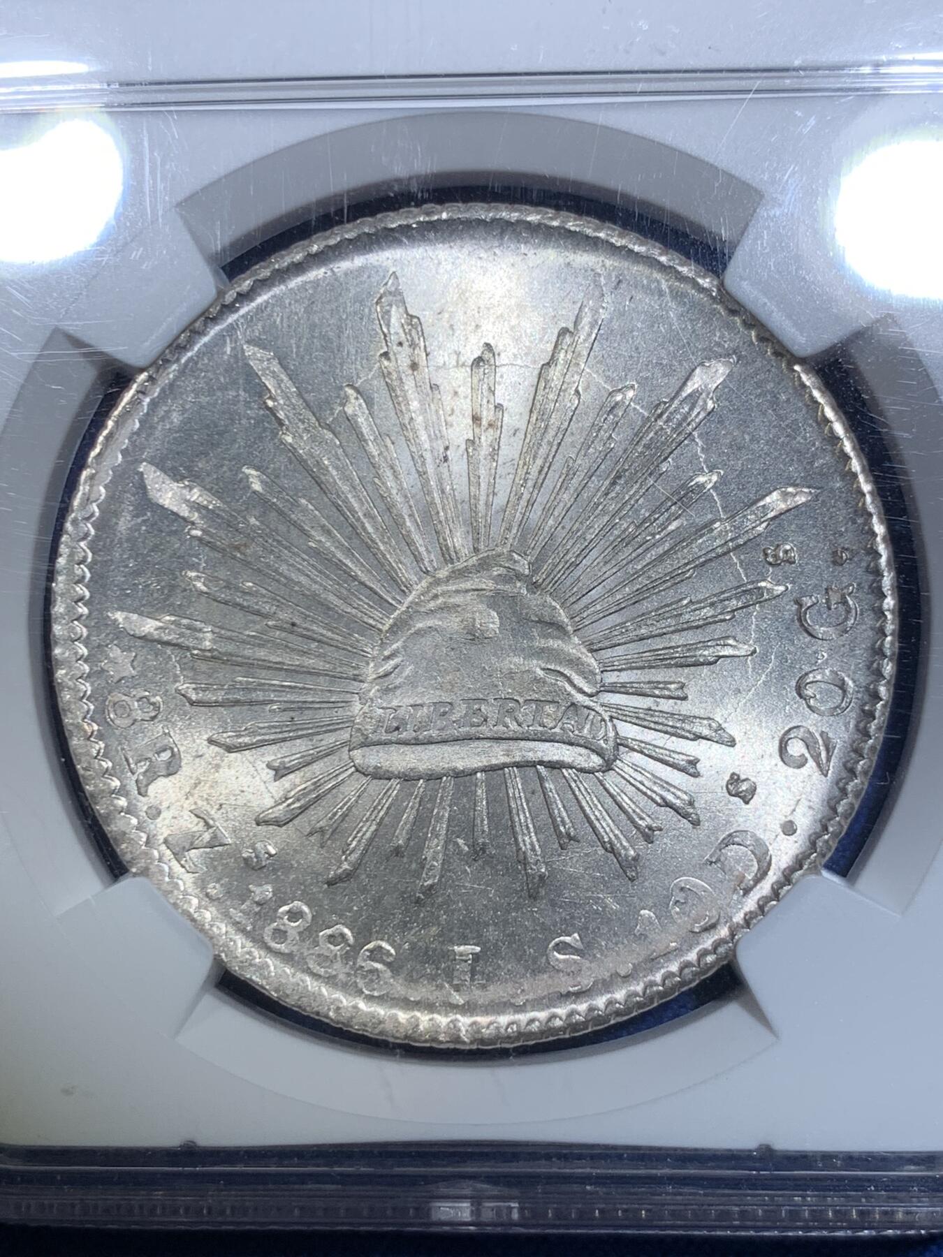 《竞宝斋》第297场- 周日，周一  2场连拍 （全场包邮） NGC MS64 墨西哥1886年8瑞尔花边鹰洋 银光闪闪