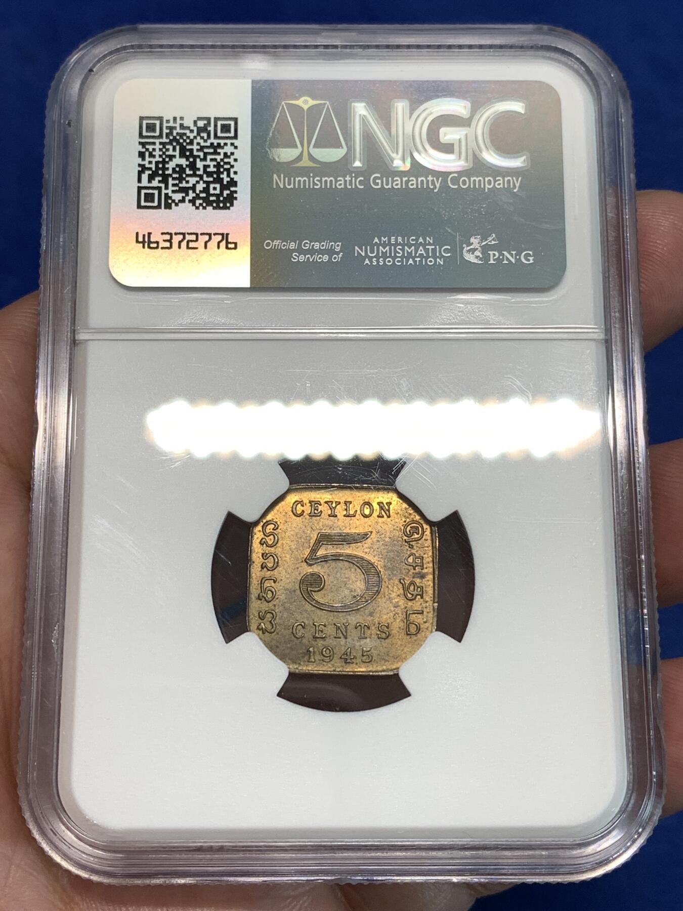 《竞宝斋》第297场- 周日，周一  2场连拍 （全场包邮） NGC MS63 1945锡兰5分 少见的异形铜币 锡兰早期的好品非常困难 两面转光 包浆厚重