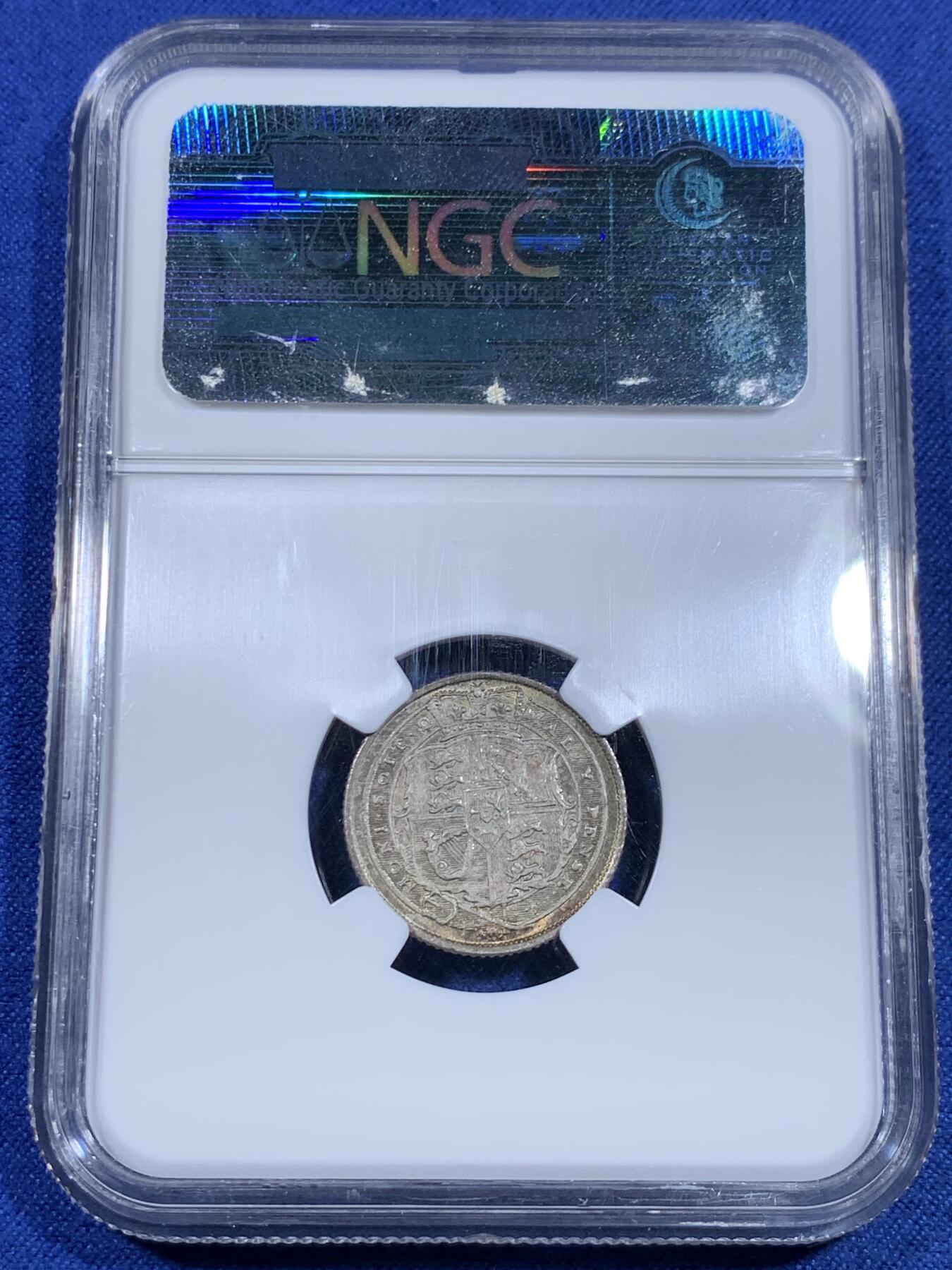 《竞宝斋》第297场- 周日，周一  2场连拍 （全场包邮） NGC MS65 1817年英国乔三牛头6便士银币，乔治三世。正面爆炸绚烂五彩，背面欧陆灰包浆。65收藏级高分，老N盒品质保障