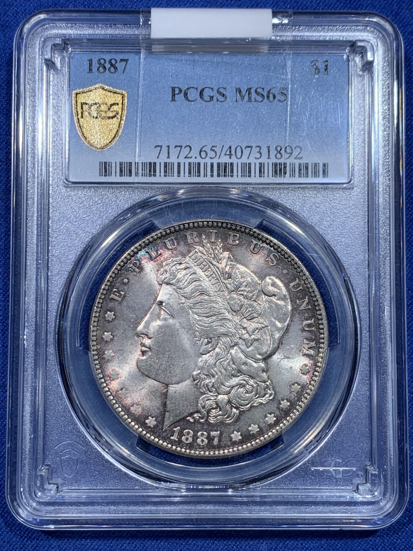 《竞宝斋》第297场- 周日，周一  2场连拍 （全场包邮） PCGS MS65 美国1887年摩根 底板干净 转光强烈 紫罗兰五彩
