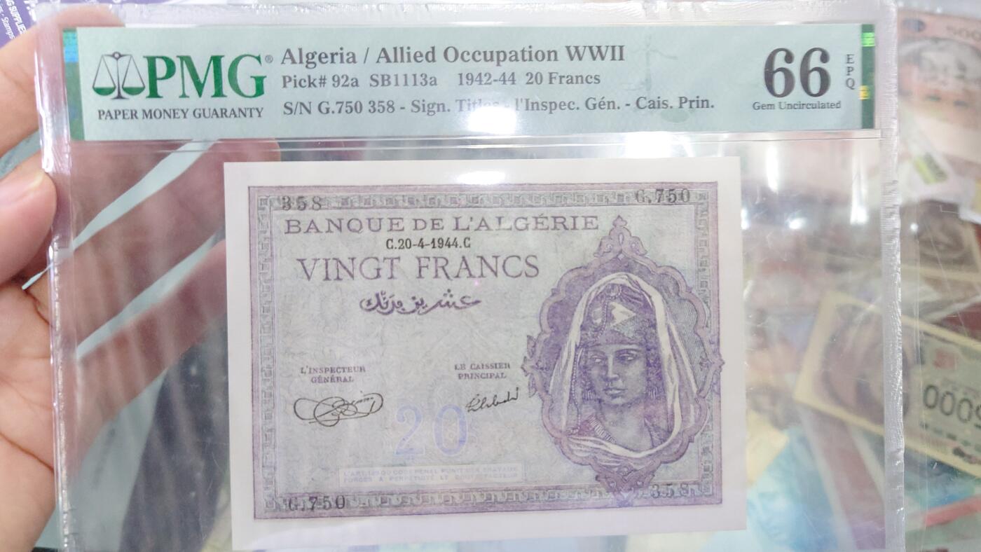 【世界钱币】精选微拍第128期暨2024年第39期  部分评级币，裸钞历史库存较低价起拍 1944年阿尔及利亚20法郎 PMG66E 无4尾8