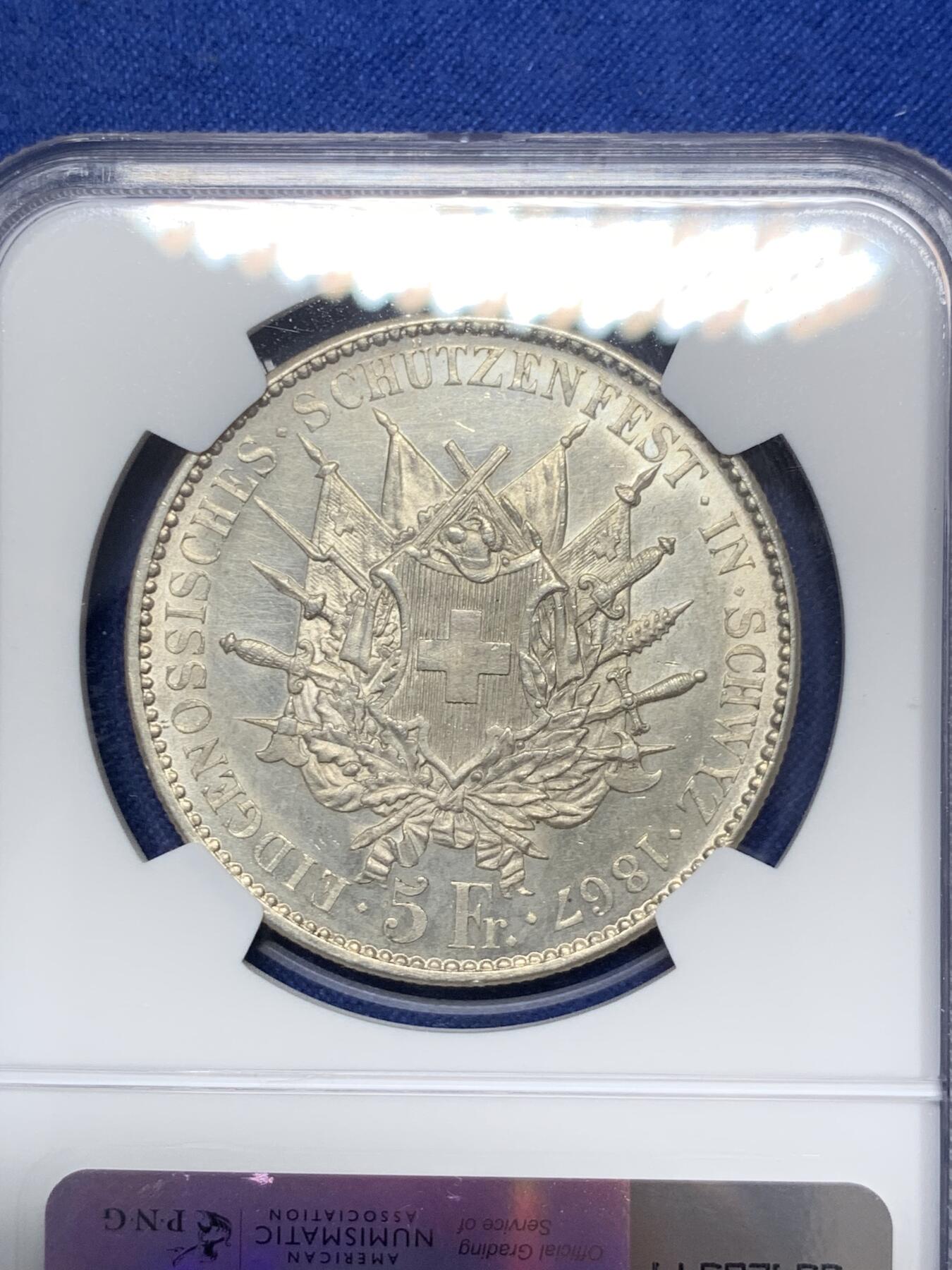《竞宝斋》第297场- 周日，周一  2场连拍 （全场包邮） NGC UNC 瑞士1867年施维茨射击节5法郎银币 发行量8000枚 底板和光感都不错，可以试试砸盒养养包浆