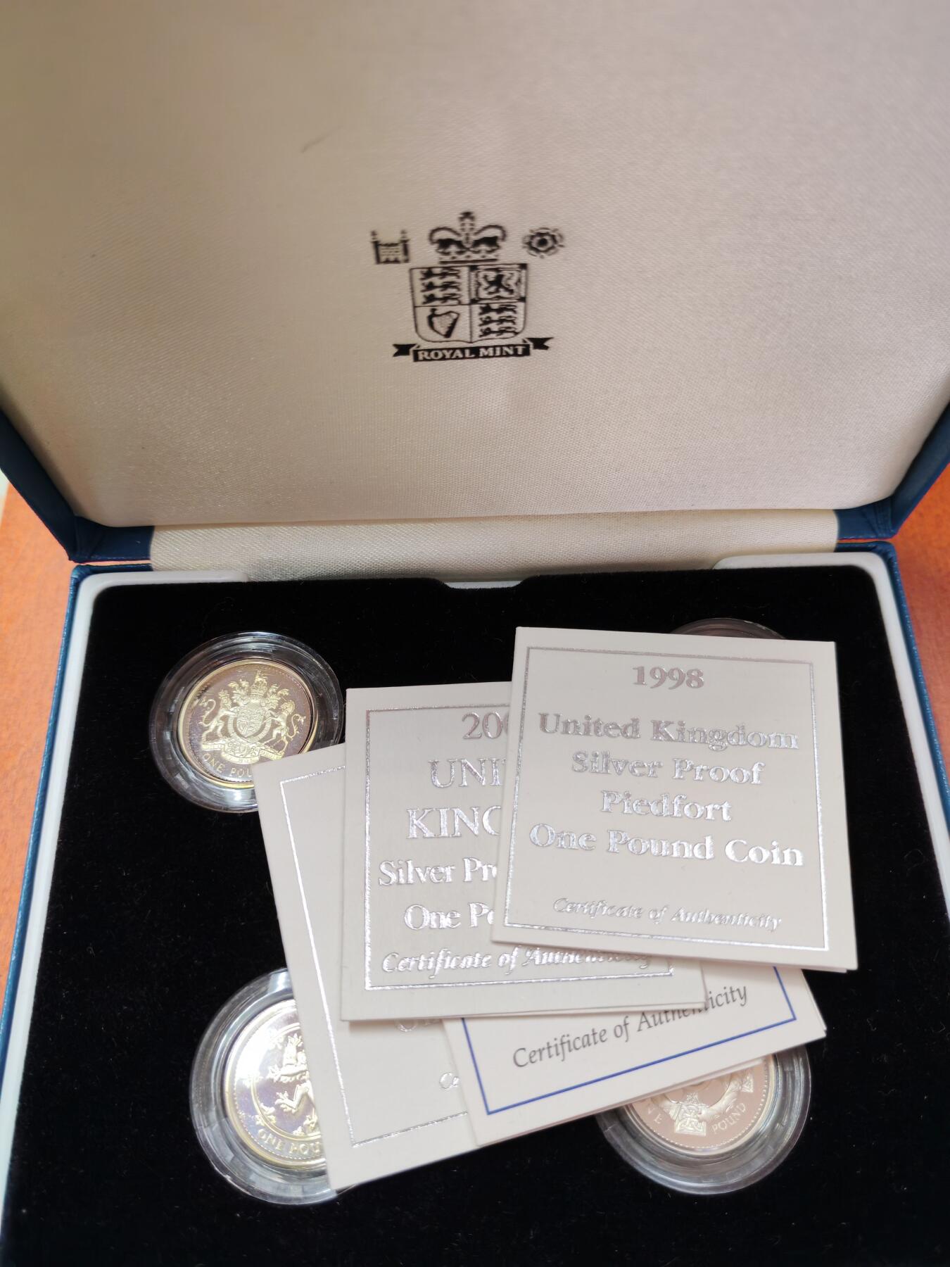 长老汇龙年精选第二十二场拍卖 1998-2001英国1英镑精制加厚银币4枚套，盒证全