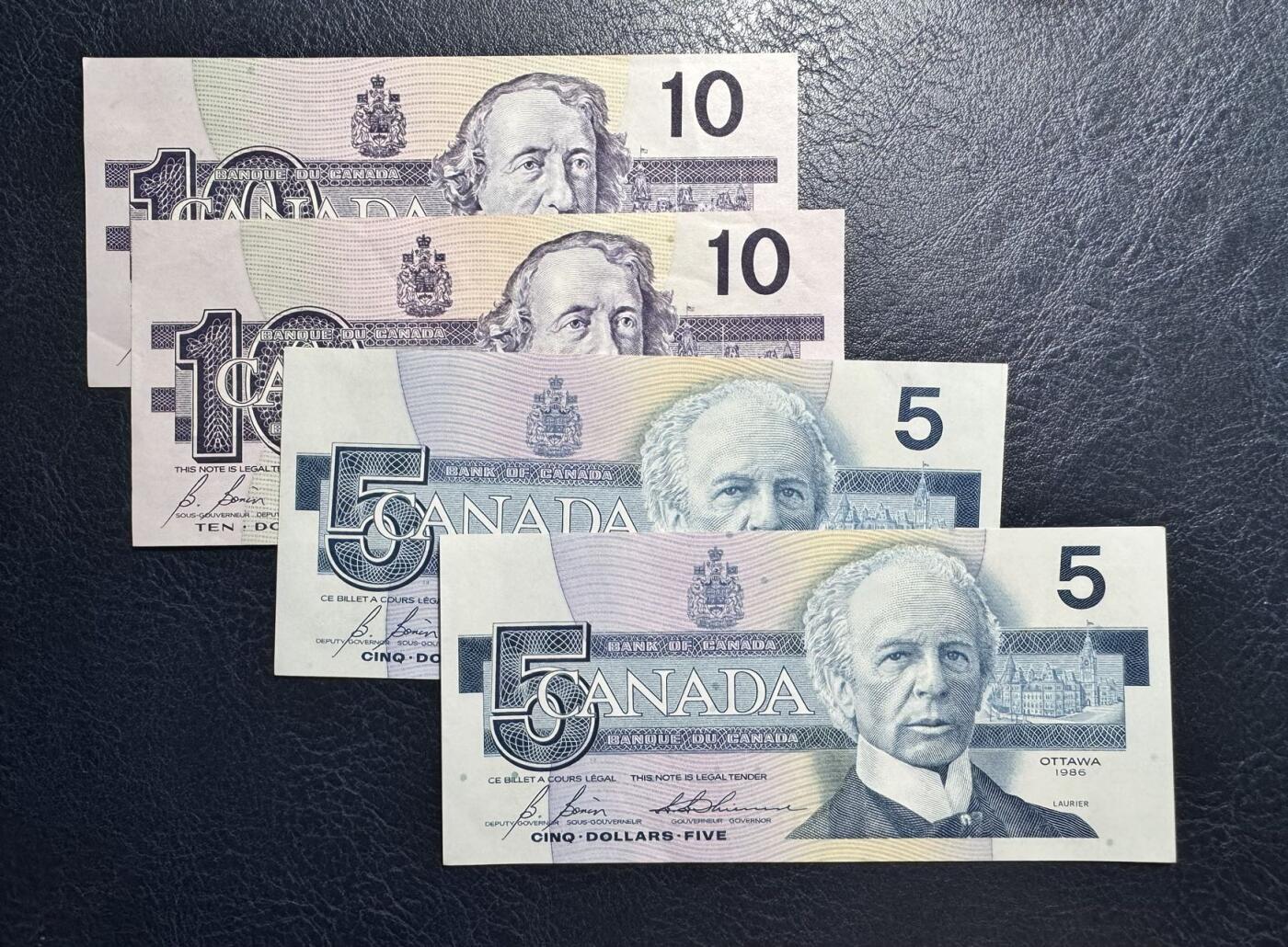 收藏联盟Quantum Auction 第369期拍卖  加拿大1986年5元和1989年10元 品相分别为UNC-和AU+