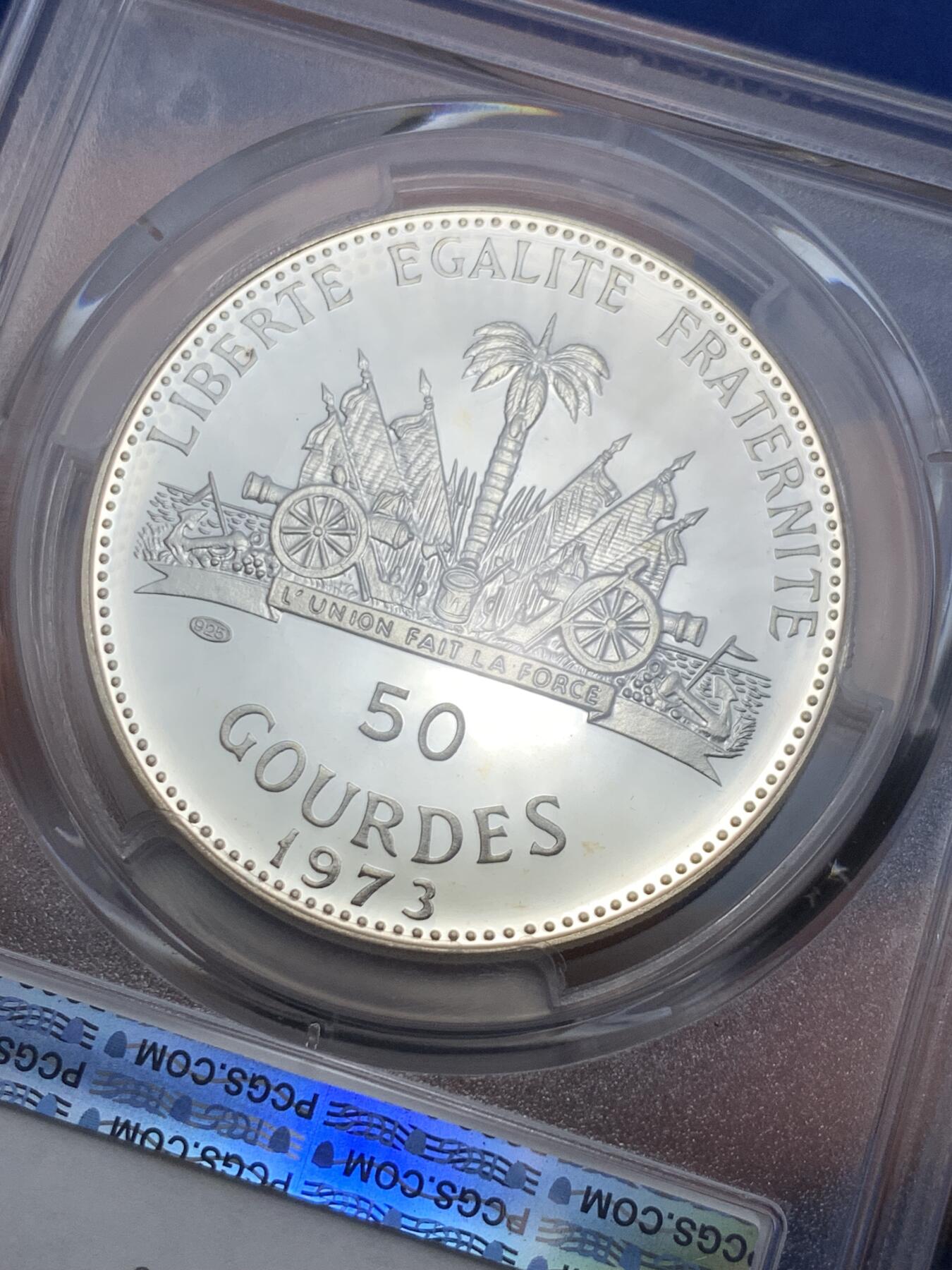 《竞宝斋》第298场- 周日，周一  2场连拍 （全场包邮） 四枚一套 PCGS PR67-69 1973年海地25-50古德银币 吹海螺的少女 带原包装钱包