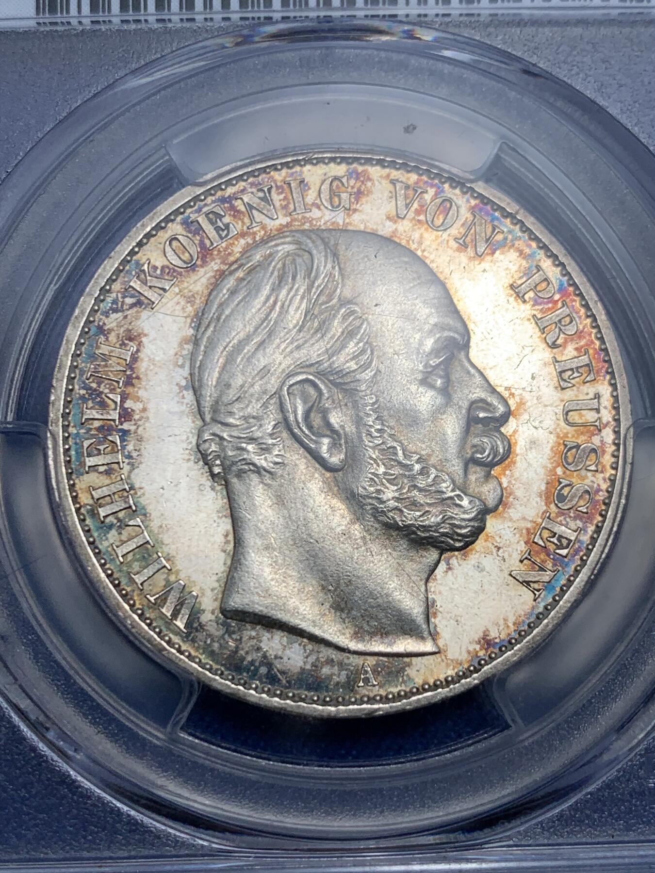 《竞宝斋》第298场- 周日，周一  2场连拍 （全场包邮） PCGS UNCD 1871年德国普鲁士普法战争胜利1泰勒 细节很好 正面有洗痕 PL带五彩状态