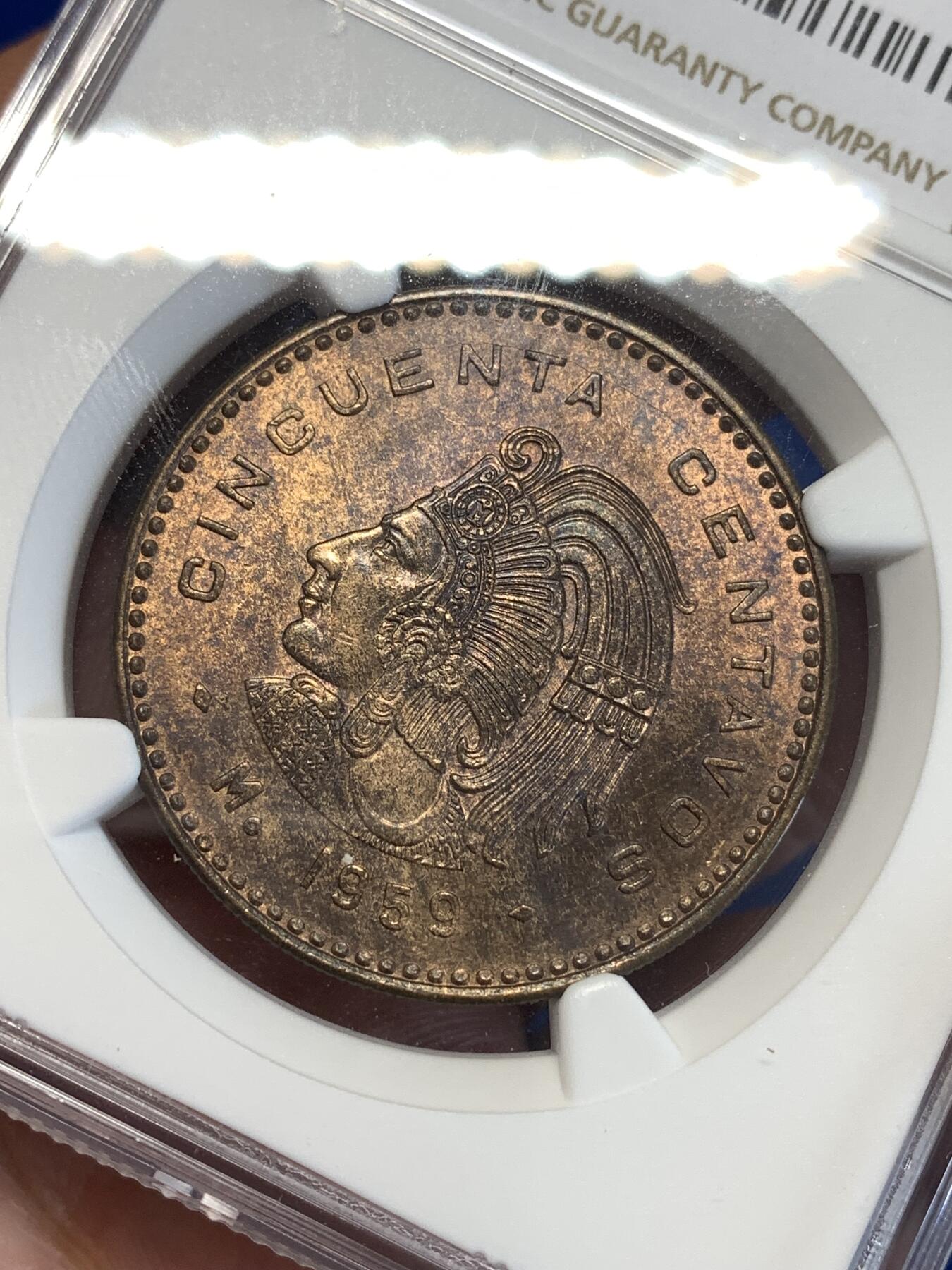 《竞宝斋》第298场- 周日，周一  2场连拍 （全场包邮） NGC MS64BN 1959 墨西哥 50分 大铜币 保存极为不易 两面的包浆和币面图案相得益彰 特别是印第安人头面 极富南美特色 手感厚重 转光漂亮