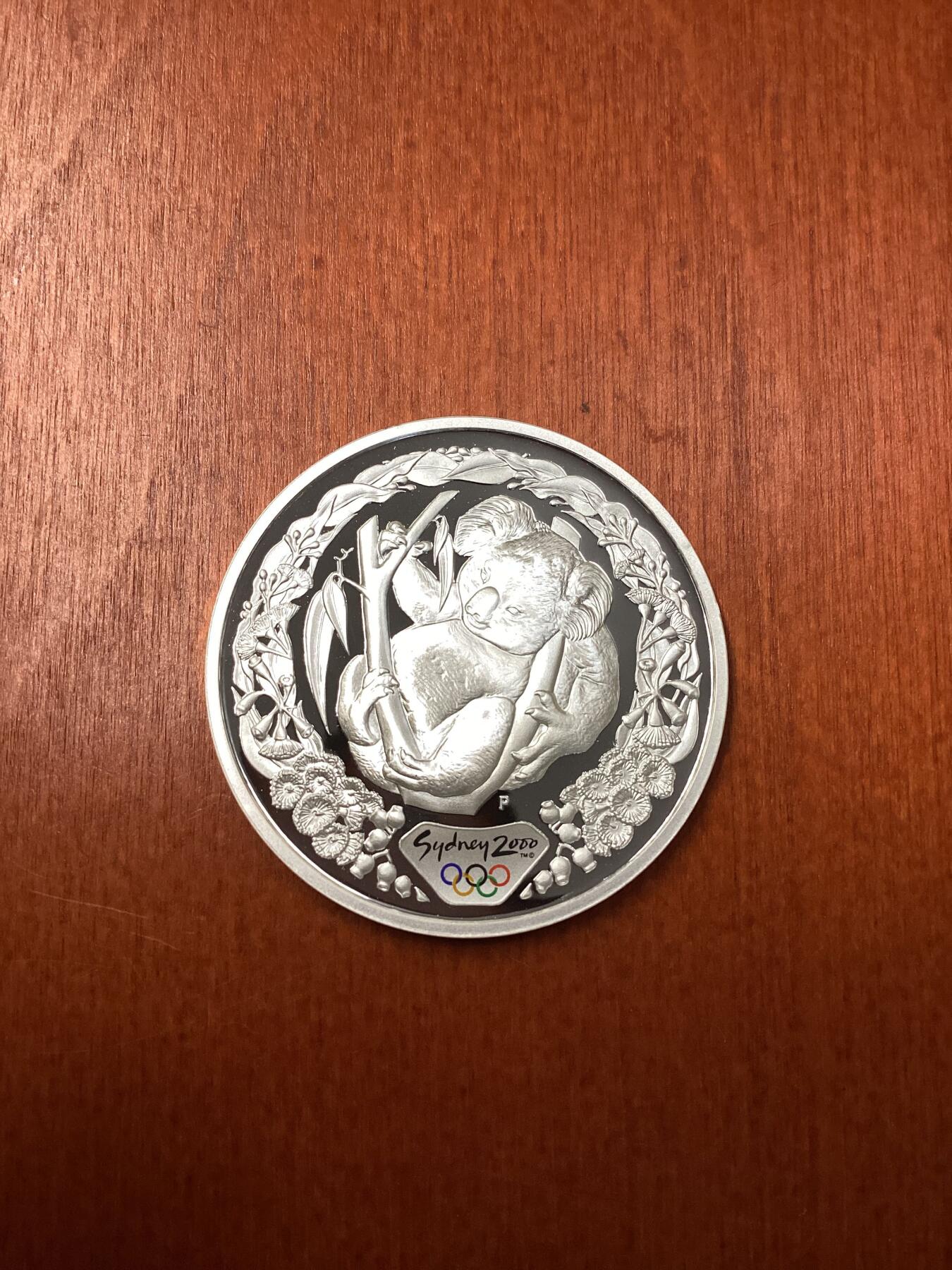 长老汇龙年精选第二十五场拍卖 2000澳大利亚悉尼奥运会考拉5澳元1盎司精制局部彩色银币