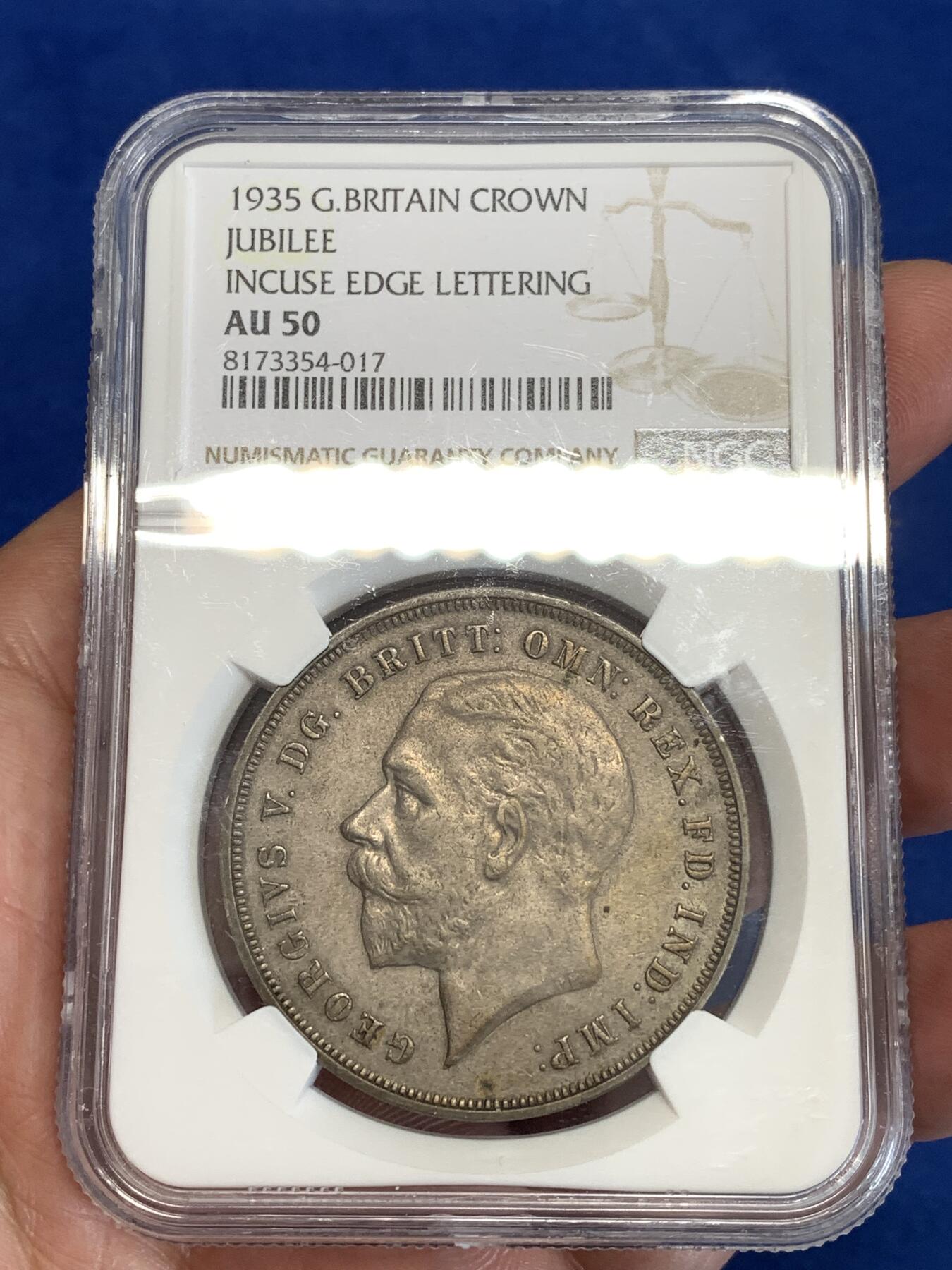 《竞宝斋》第298场- 周日，周一  2场连拍 （全场包邮） NGC AU50英国1935年乔治五世木马剑银价上浮经典品种疑似低评超高性价比！暗色币面尽显时光痕迹！