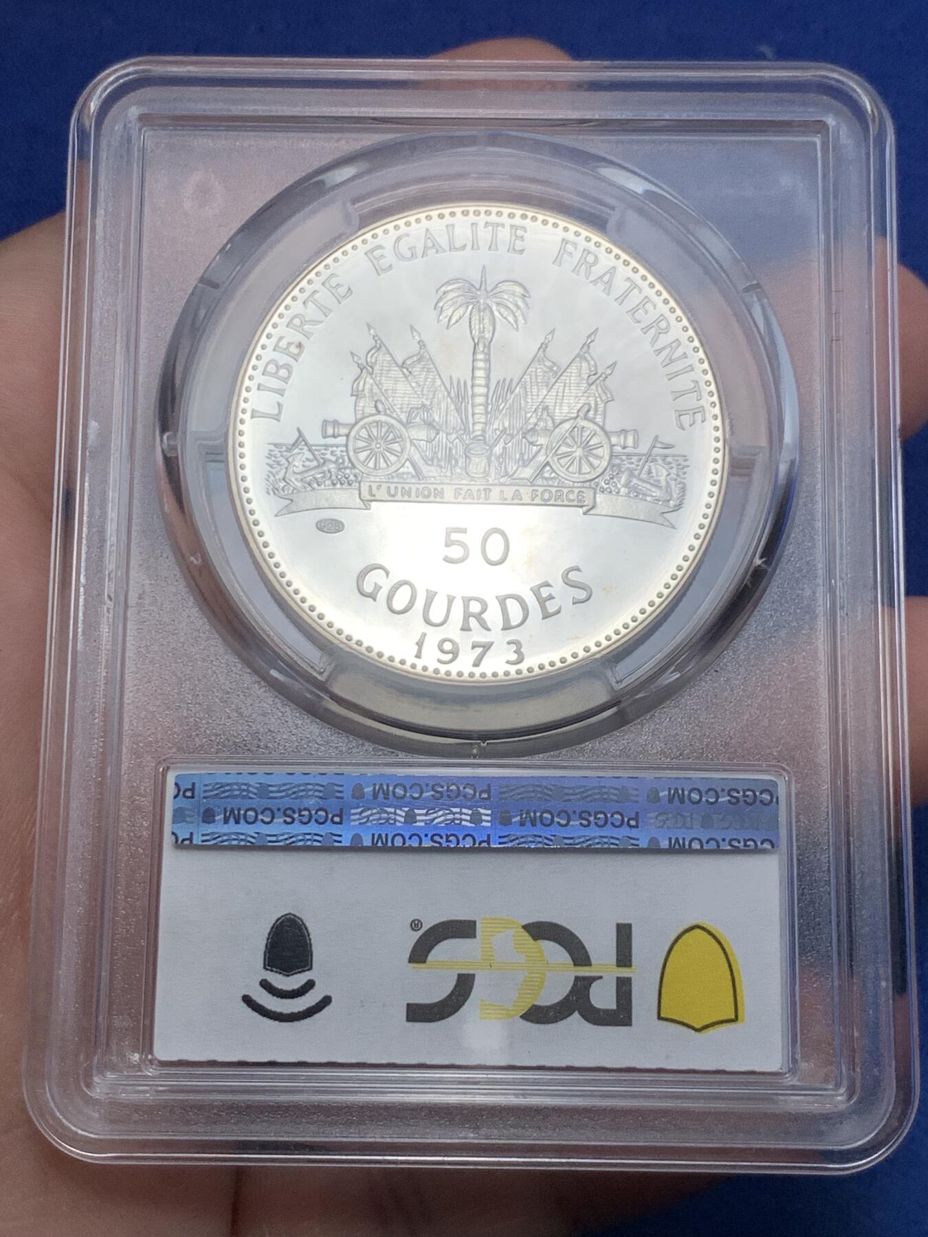 《竞宝斋》第298场- 周日，周一  2场连拍 （全场包邮） 四枚一套 PCGS PR67-69 1973年海地25-50古德银币 吹海螺的少女 带原包装钱包