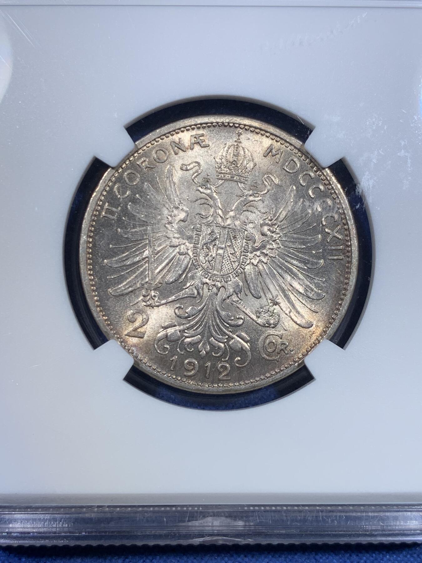 《竞宝斋》第299场- 周日，周一  2场连拍 （全场包邮） NGC MS63 奥地利1912两克朗银币，双面环彩，转光强烈，双头鹰极富力量感