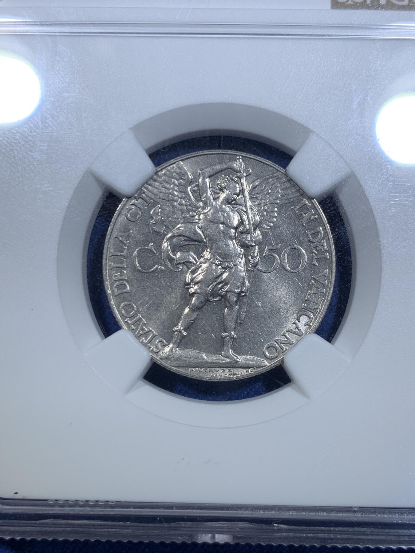 《竞宝斋》第299场- 周日，周一  2场连拍 （全场包邮） NGC MS63 梵蒂冈1934年50分大天使持剑 教皇过最美的小辅币~背面区别于其他年份。