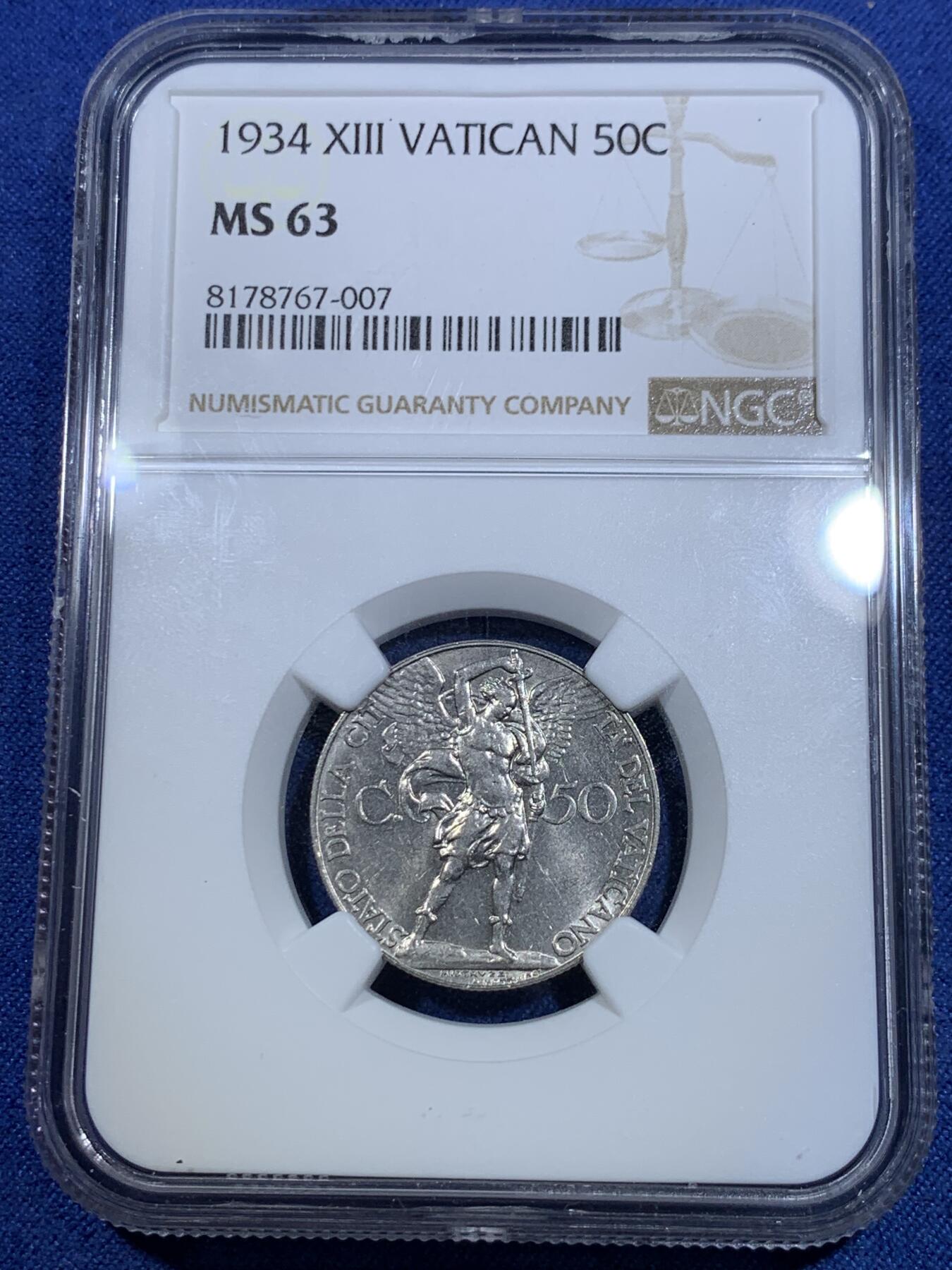 《竞宝斋》第299场- 周日，周一  2场连拍 （全场包邮） NGC MS63 梵蒂冈1934年50分大天使持剑 教皇过最美的小辅币~背面区别于其他年份。