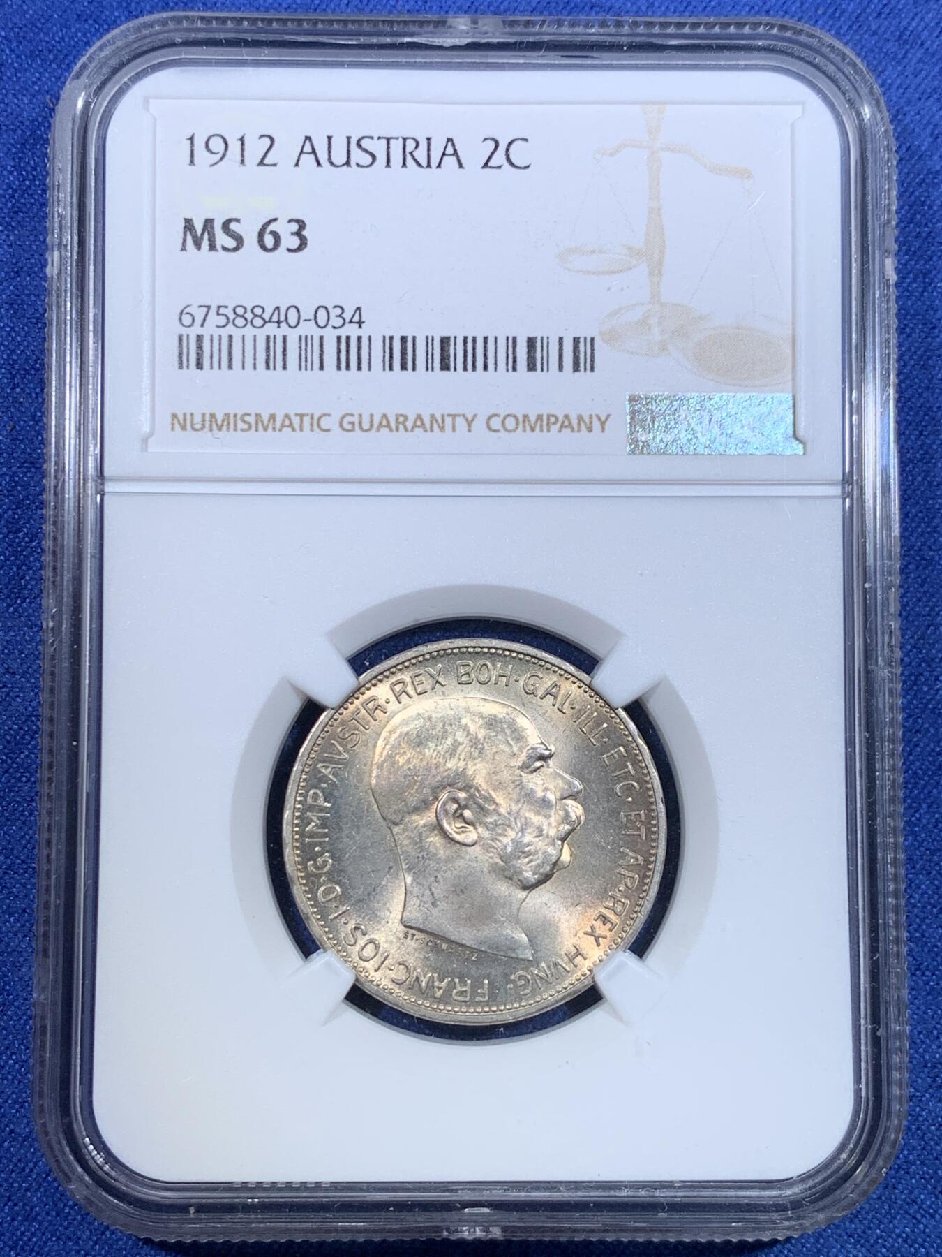 《竞宝斋》第299场- 周日，周一  2场连拍 （全场包邮） NGC MS63 奥地利1912两克朗银币，双面环彩，转光强烈，双头鹰极富力量感