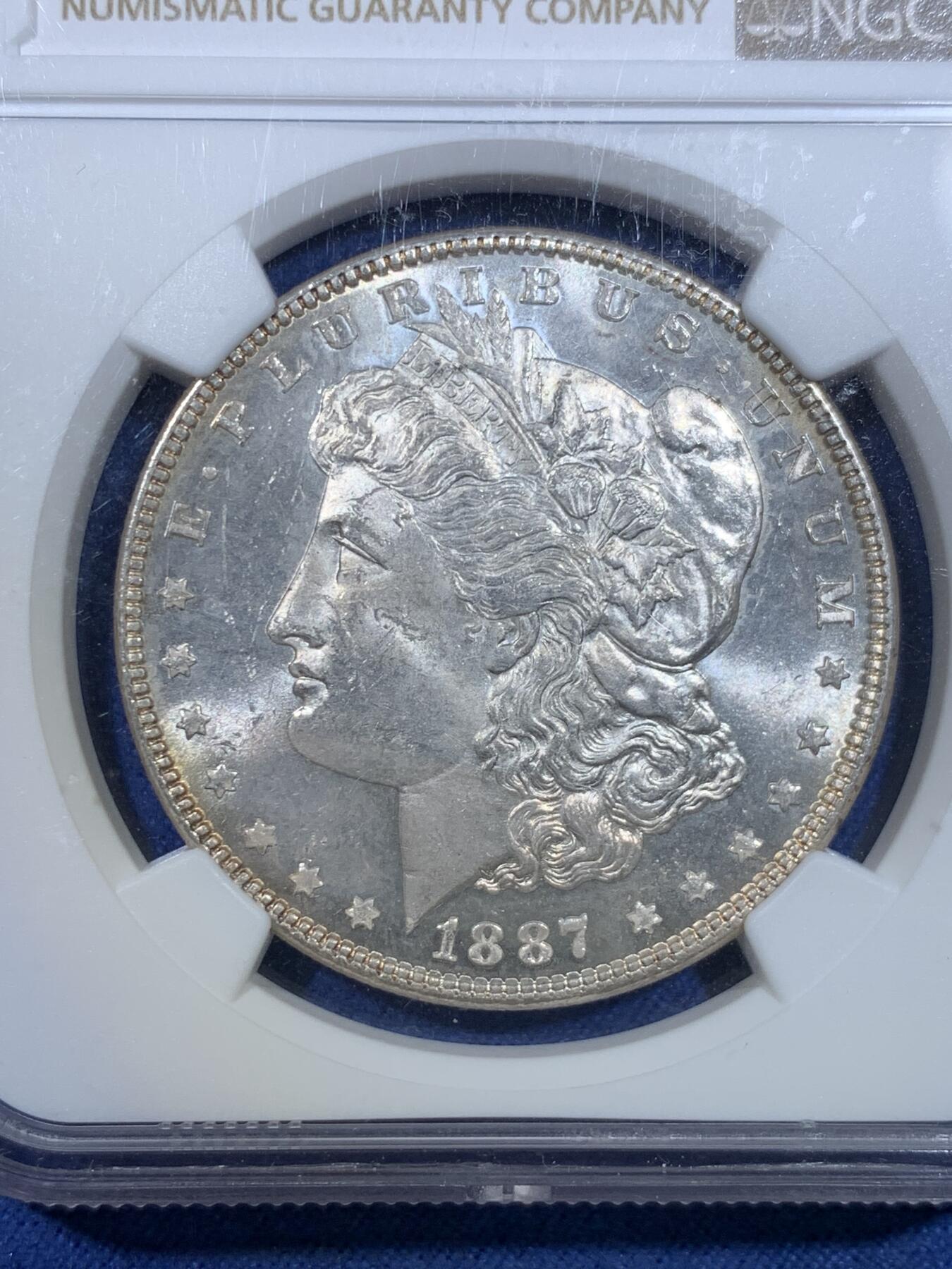 《竞宝斋》第299场- 周日，周一  2场连拍 （全场包邮） NGC MS63 美国1887年摩根银币 双面环金彩包浆 镜面感真的强 鹰面状态极好