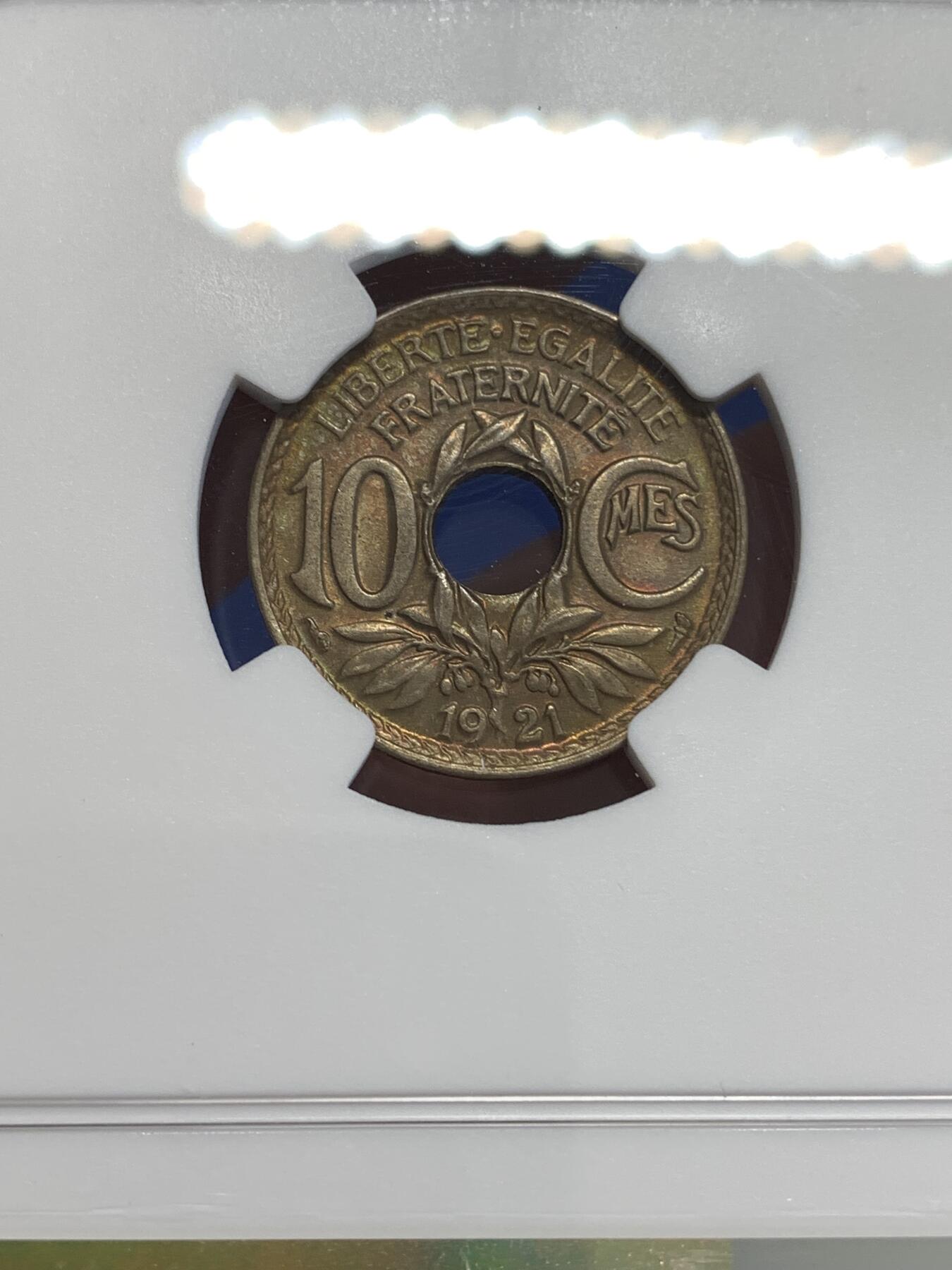 《竞宝斋》第299场- 周日，周一  2场连拍 （全场包邮） NGC MS63 法国1921年10分中孔镍币，深红色包浆炫彩，经典设计