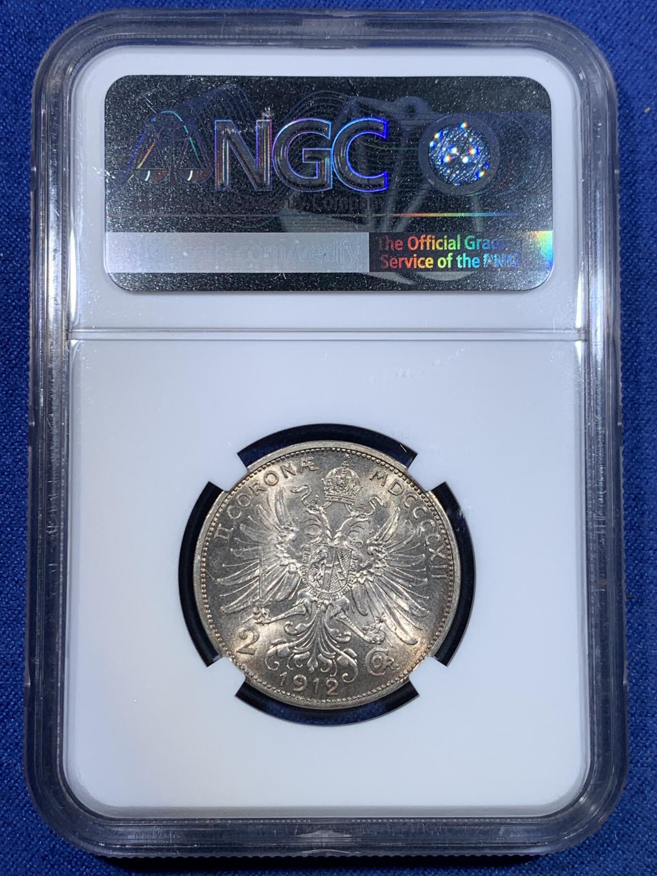 《竞宝斋》第299场- 周日，周一  2场连拍 （全场包邮） NGC MS63 奥地利1912两克朗银币，双面环彩，转光强烈，双头鹰极富力量感