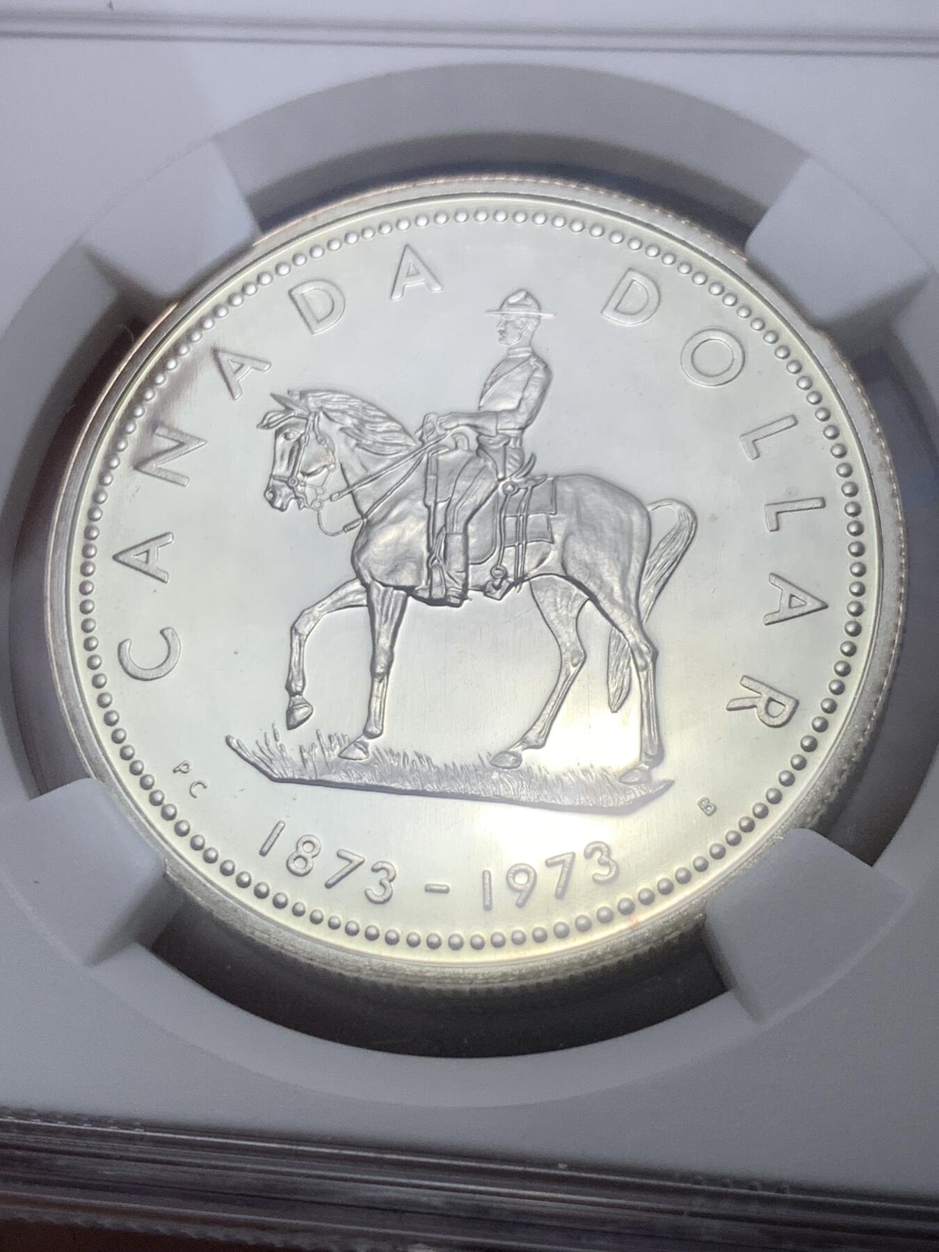 《竞宝斋》第299场- 周日，周一  2场连拍 （全场包邮） NGC SP64 加拿大1973年皇家骑警精制纪念银币 镜面美品