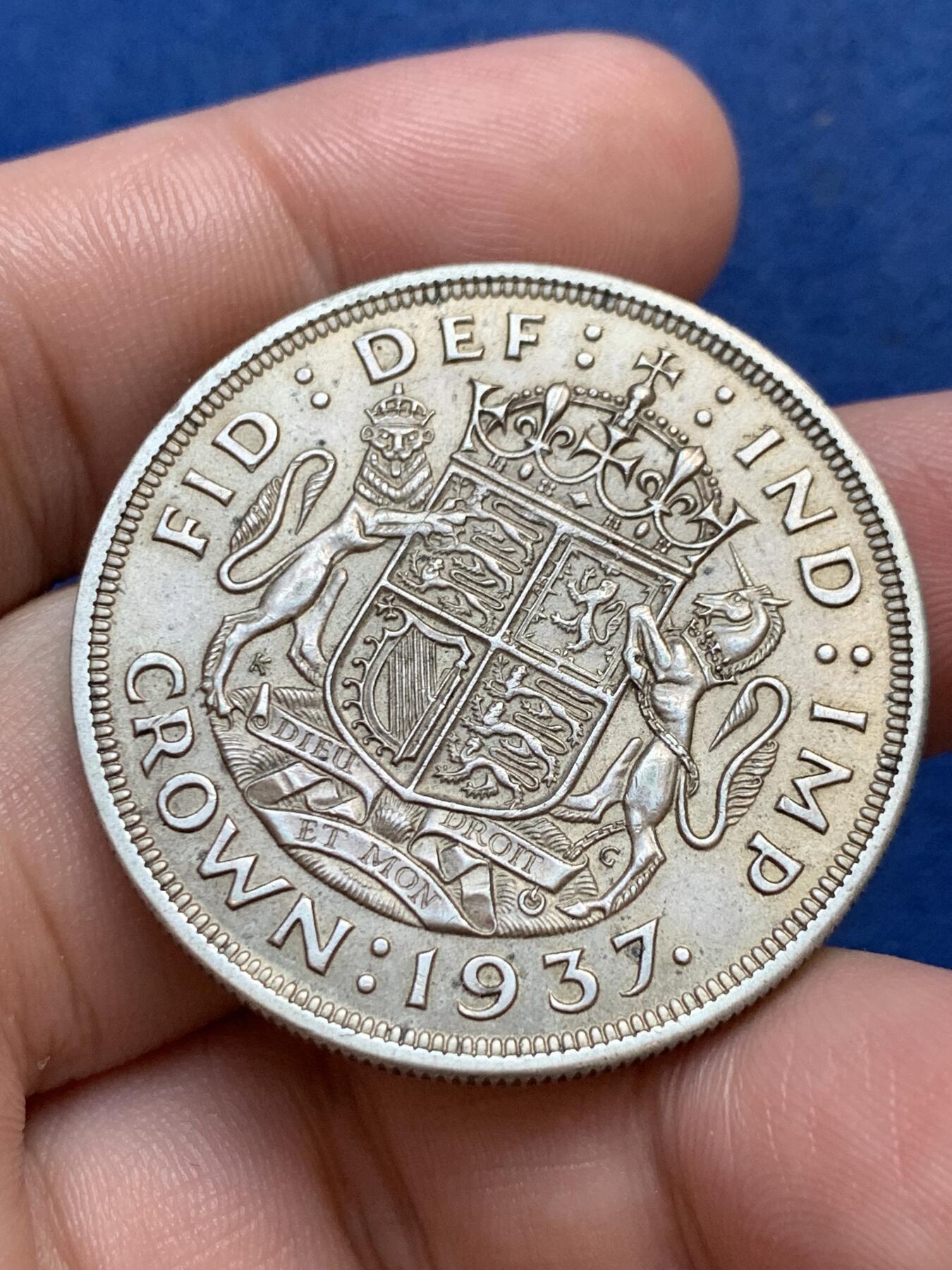 《竞宝斋》第299场- 周日，周一  2场连拍 （全场包邮） 英国1937年 乔治六世一克朗银币 AU带专光 背面品相很好加