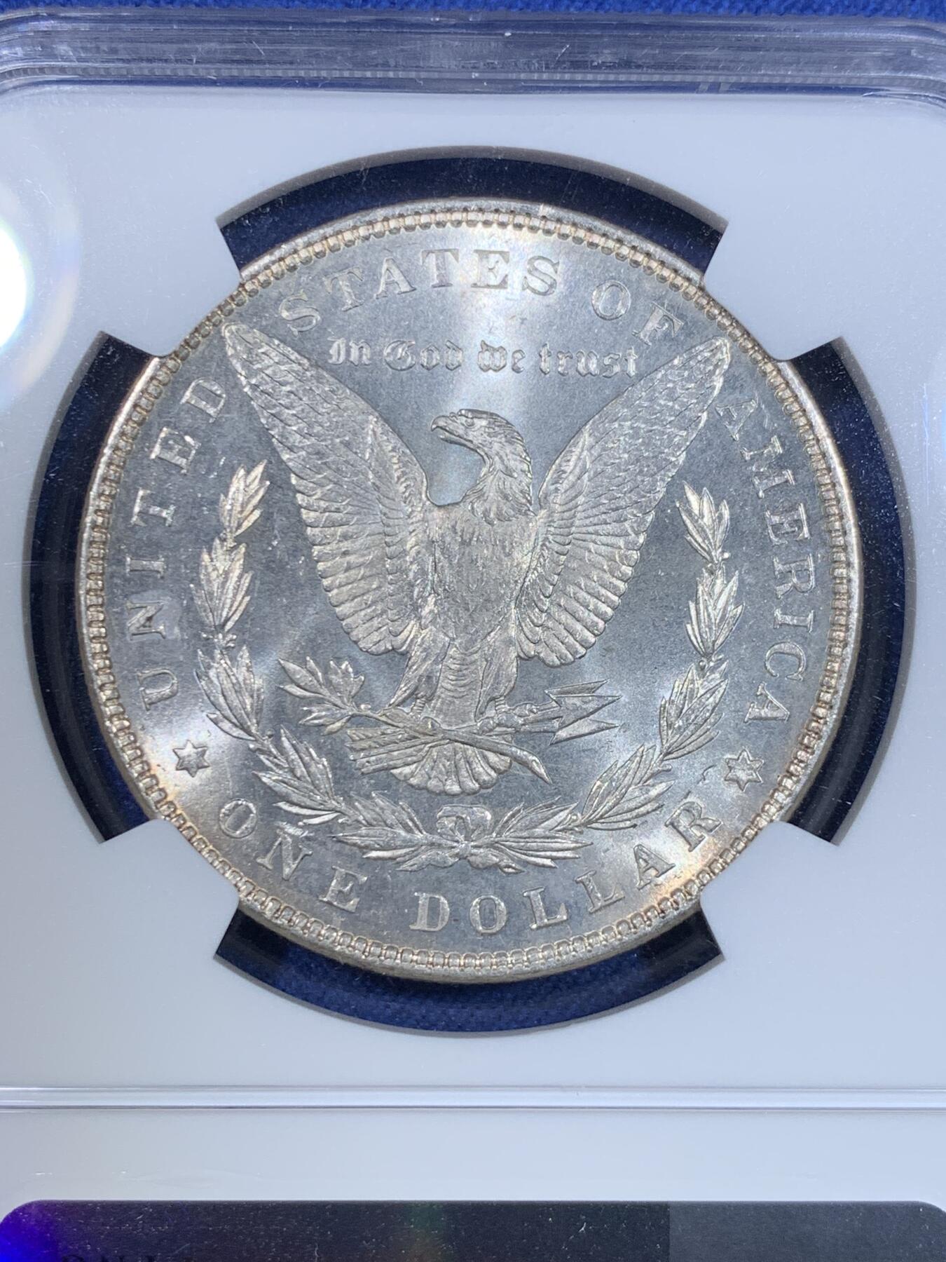 《竞宝斋》第299场- 周日，周一  2场连拍 （全场包邮） NGC MS63 美国1887年摩根银币 双面环金彩包浆 镜面感真的强 鹰面状态极好