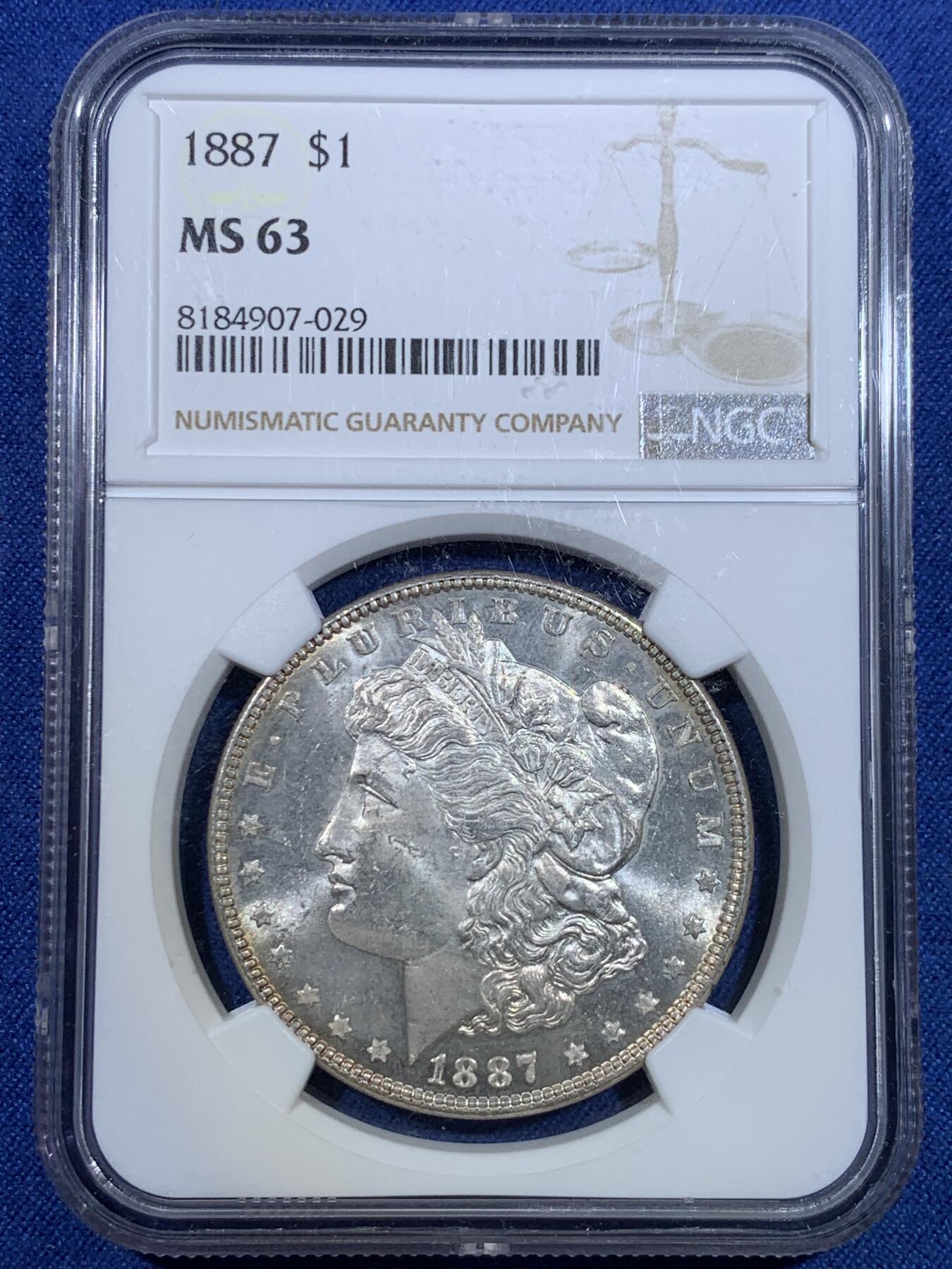 《竞宝斋》第299场- 周日，周一  2场连拍 （全场包邮） NGC MS63 美国1887年摩根银币 双面环金彩包浆 镜面感真的强 鹰面状态极好