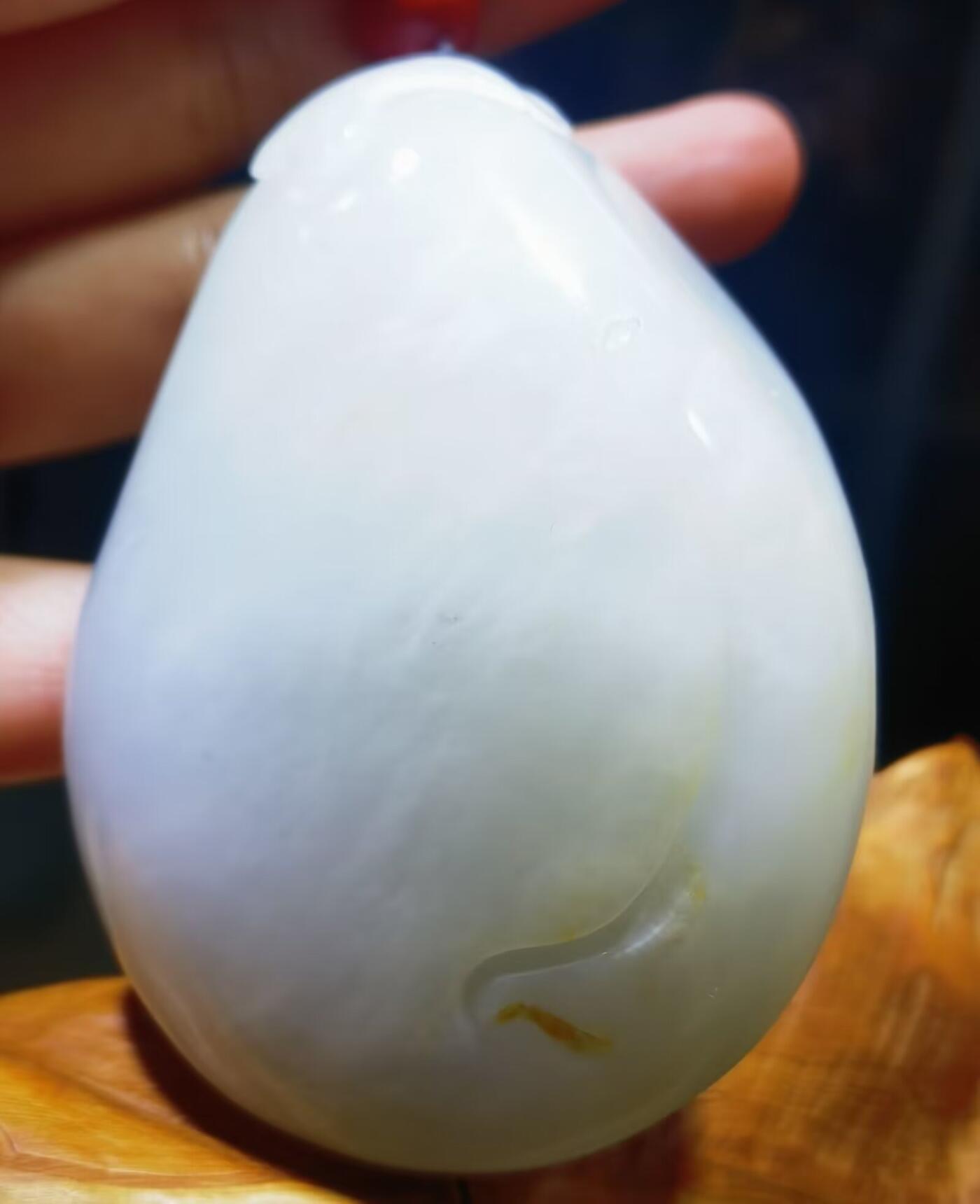 和田玉手把件童子献寿福在眼前