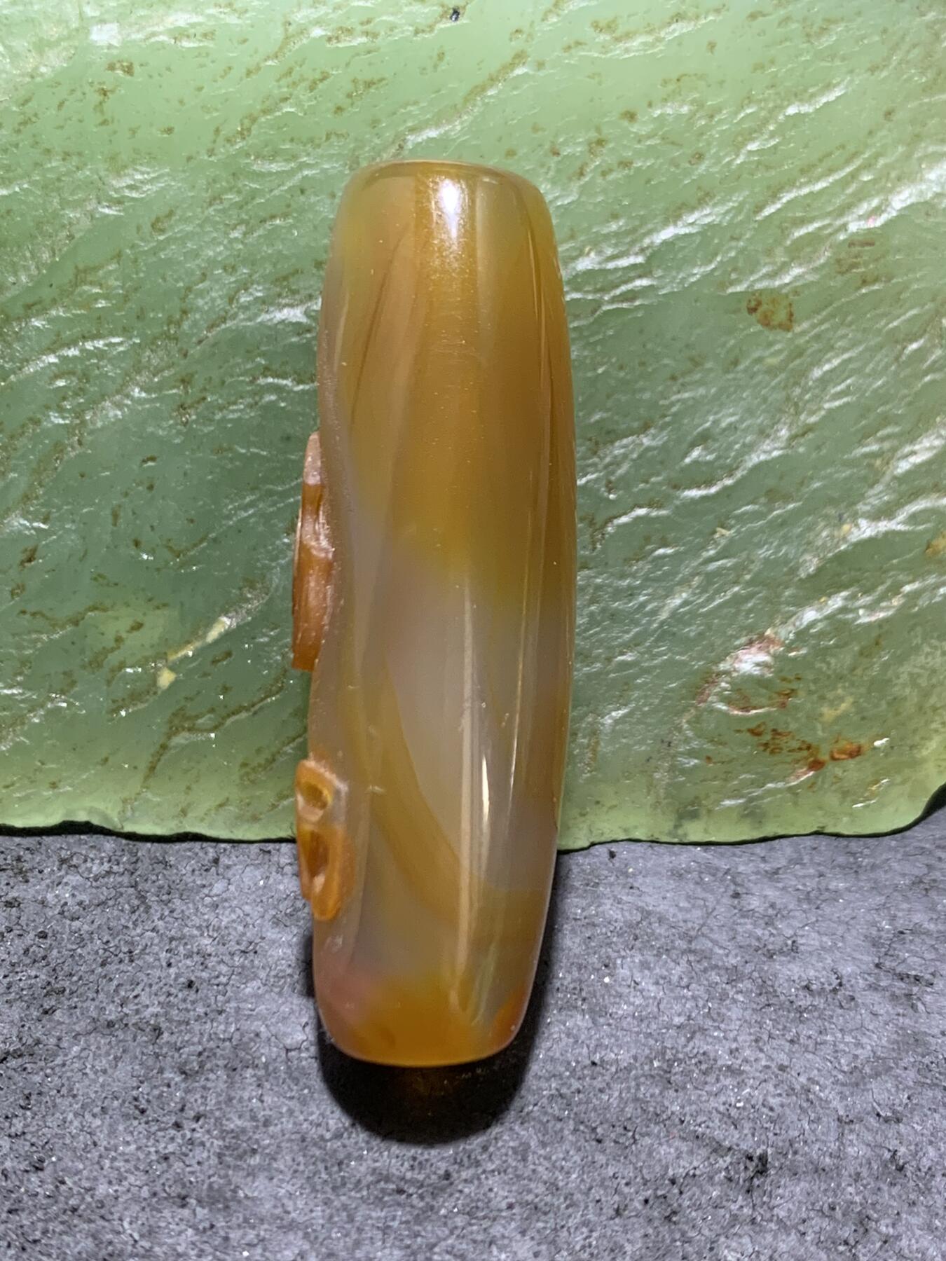 精美亚光高玉化巴西玛瑙手工俏色巧雕小提琴音符桶珠一个