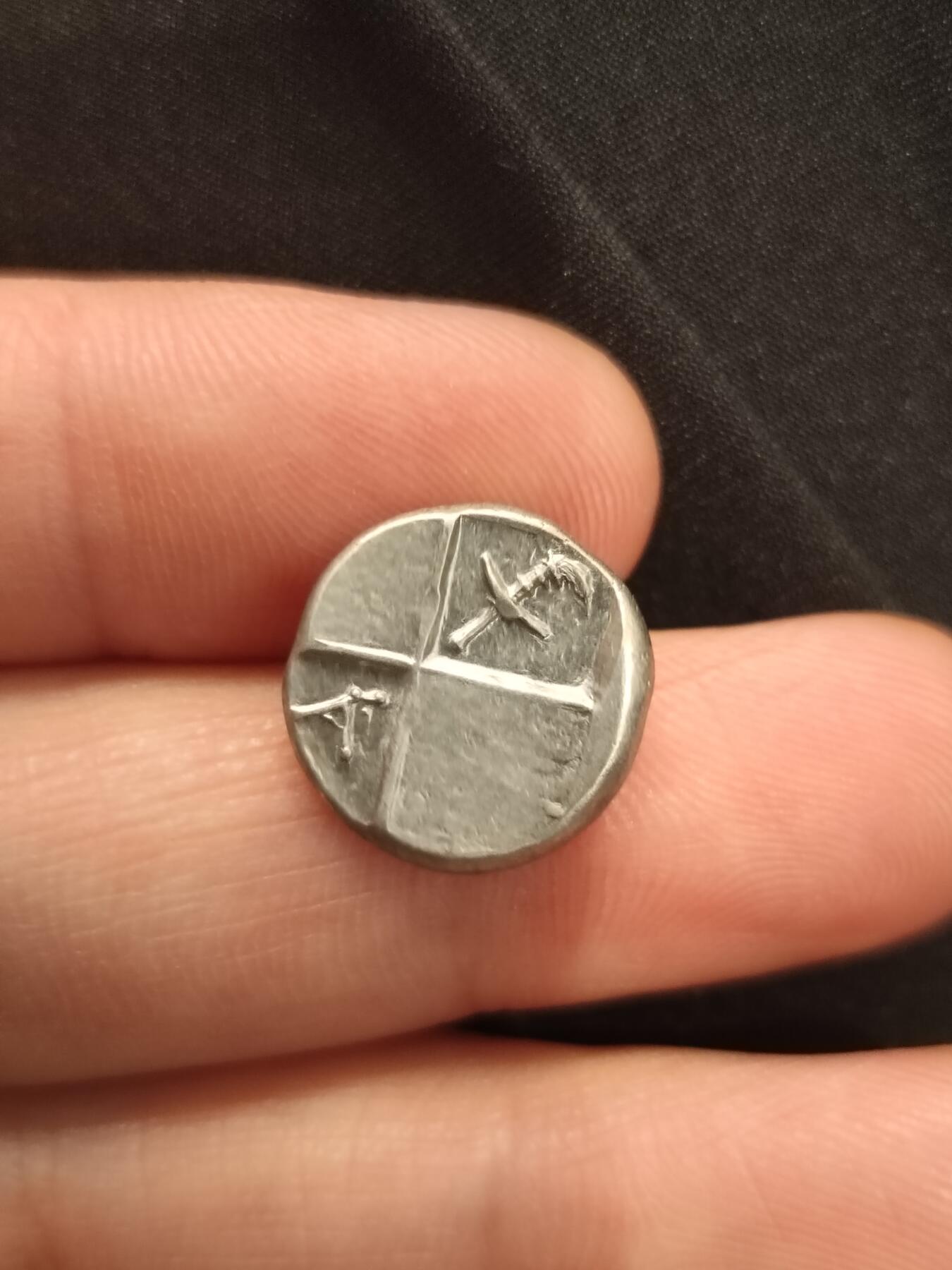古希腊银币回首狮