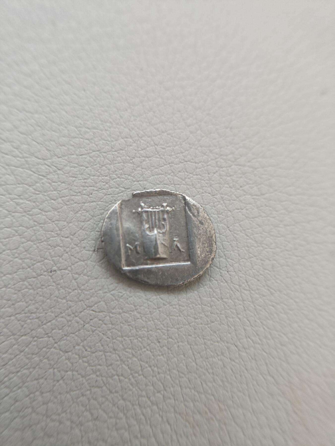 古希腊银币阿波罗与七弦琴