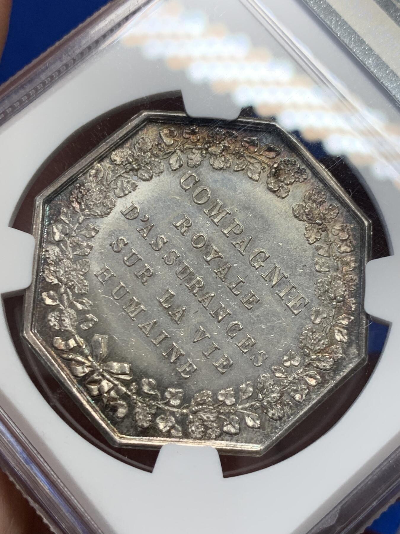 《竞宝斋》第302场- 周日，周一，周二  3场连拍 （全场包邮） NGC MS64 法国皇家保险公司八角银章，早期船首边铭，章面光泽极其顺滑，正反面淡彩包浆，八角里的顶级品相，实物更美