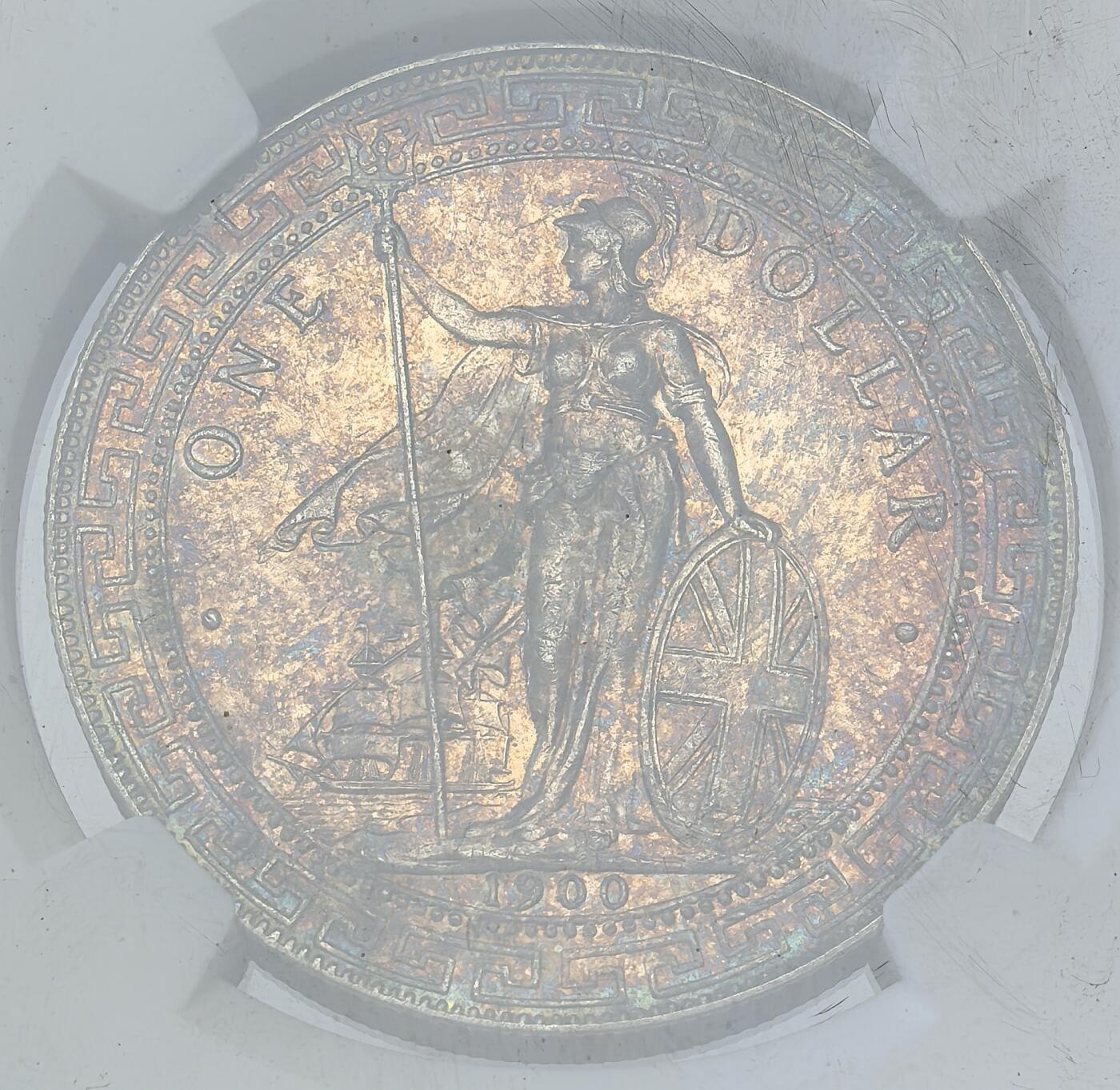凡希社世界钱币微拍第二百八十三期 1900B站洋港光壹元NGC-MS62，紫金油彩，实物相当漂亮的一枚！