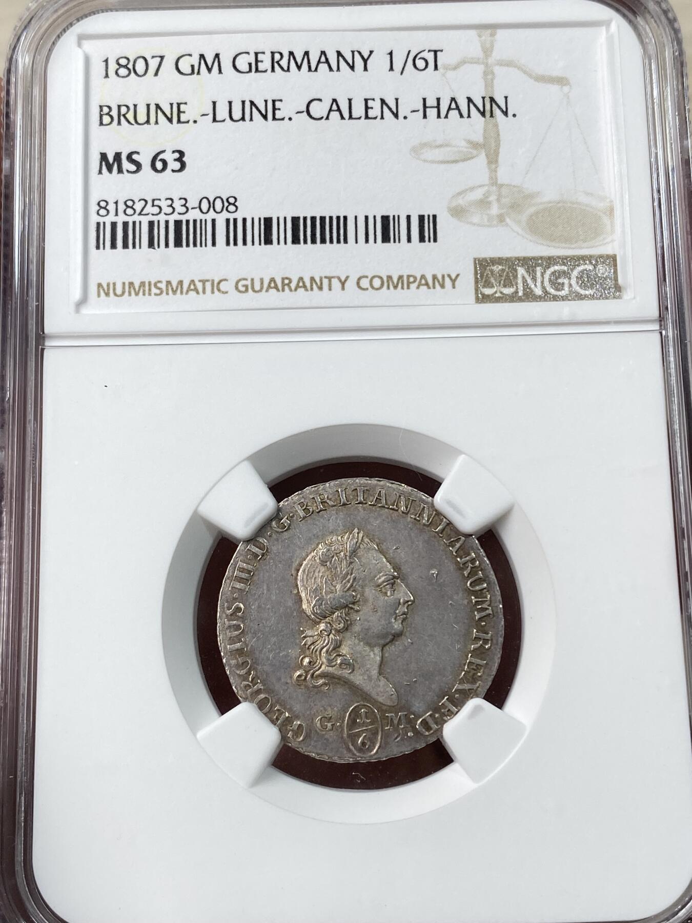 万国钱币拍卖第033期 NGC MS63 1807年德国布伦斯瑞克-吕纳堡-卡伦堡-汉诺威英系共主乔治三世1/6泰勒 原味欧洲包浆 顶级品相