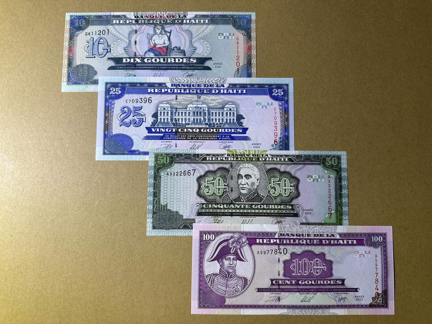 《张总收藏》166期-周日外币精品 海地10、25、50、100古德4张 UNC 2000年