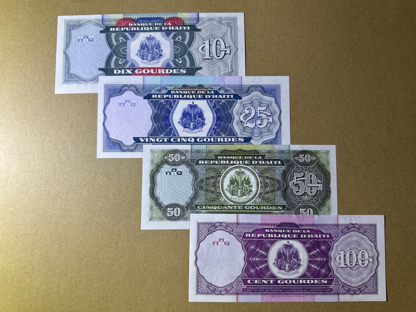 《张总收藏》166期-周日外币精品 海地10、25、50、100古德4张 UNC 2000年