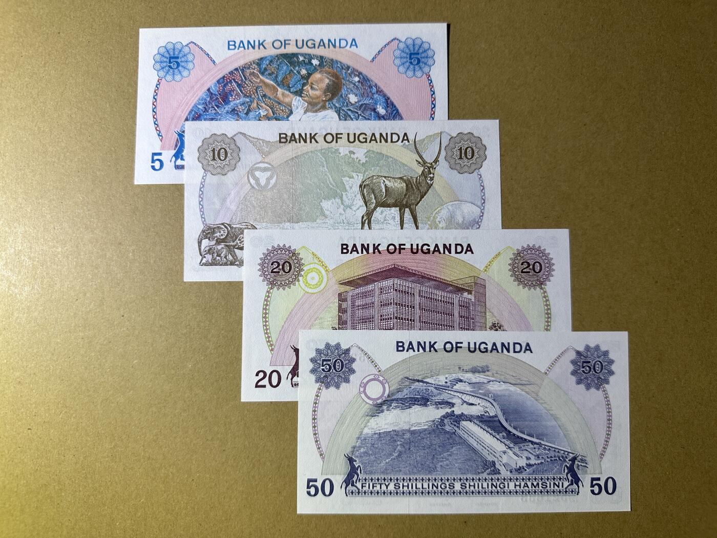 《张总收藏》166期-周日外币精品 乌干达5、10、20、50先令4张 UNC 1979年 全程无4