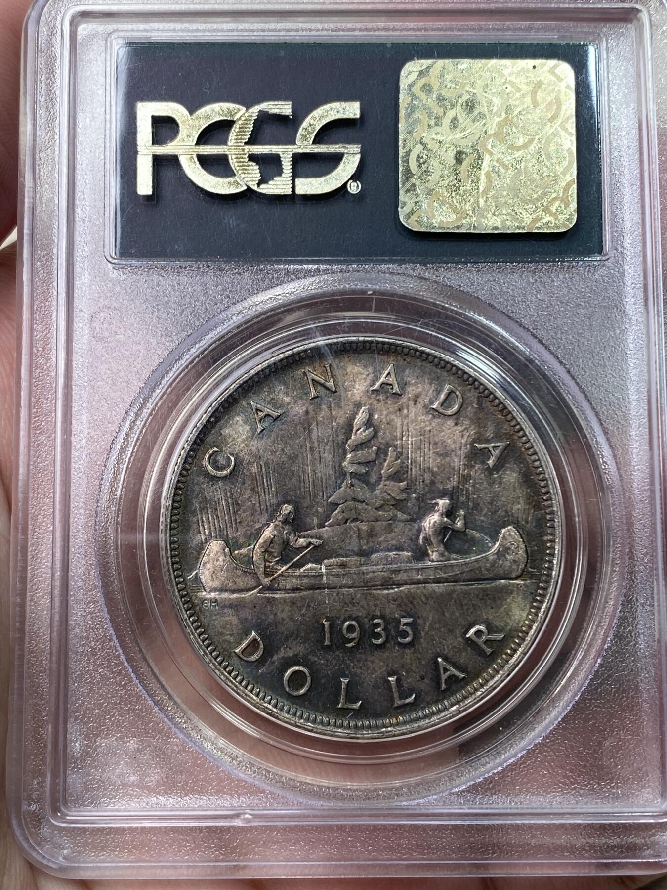 万国钱币拍卖第033期 PCGS MS64 1935英属加拿大乔治五世划船一元 原味五彩转光