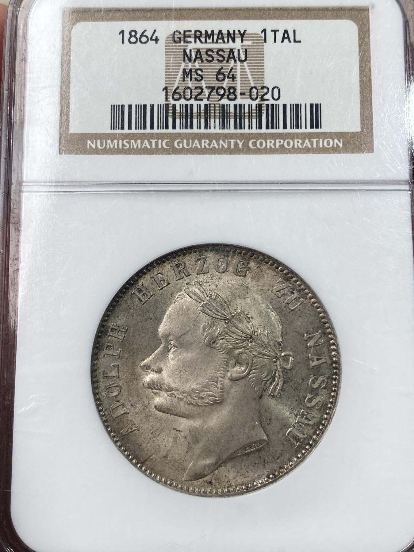 万国钱币拍卖第033期 NGC MS64 1864年德国拿骚阿道夫公爵登基25周年纪念流通1泰勒 原味纸袋包浆也盖不住其原光迸发 N记老盒值得典藏