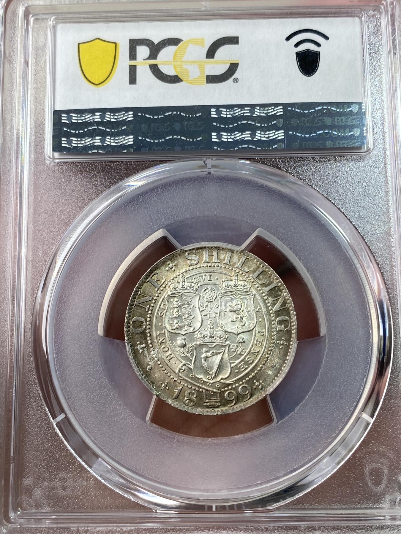万国钱币拍卖第033期 PCGS MS64 1899年英国维多利亚女皇批纱1先令银币 淡环彩曝光