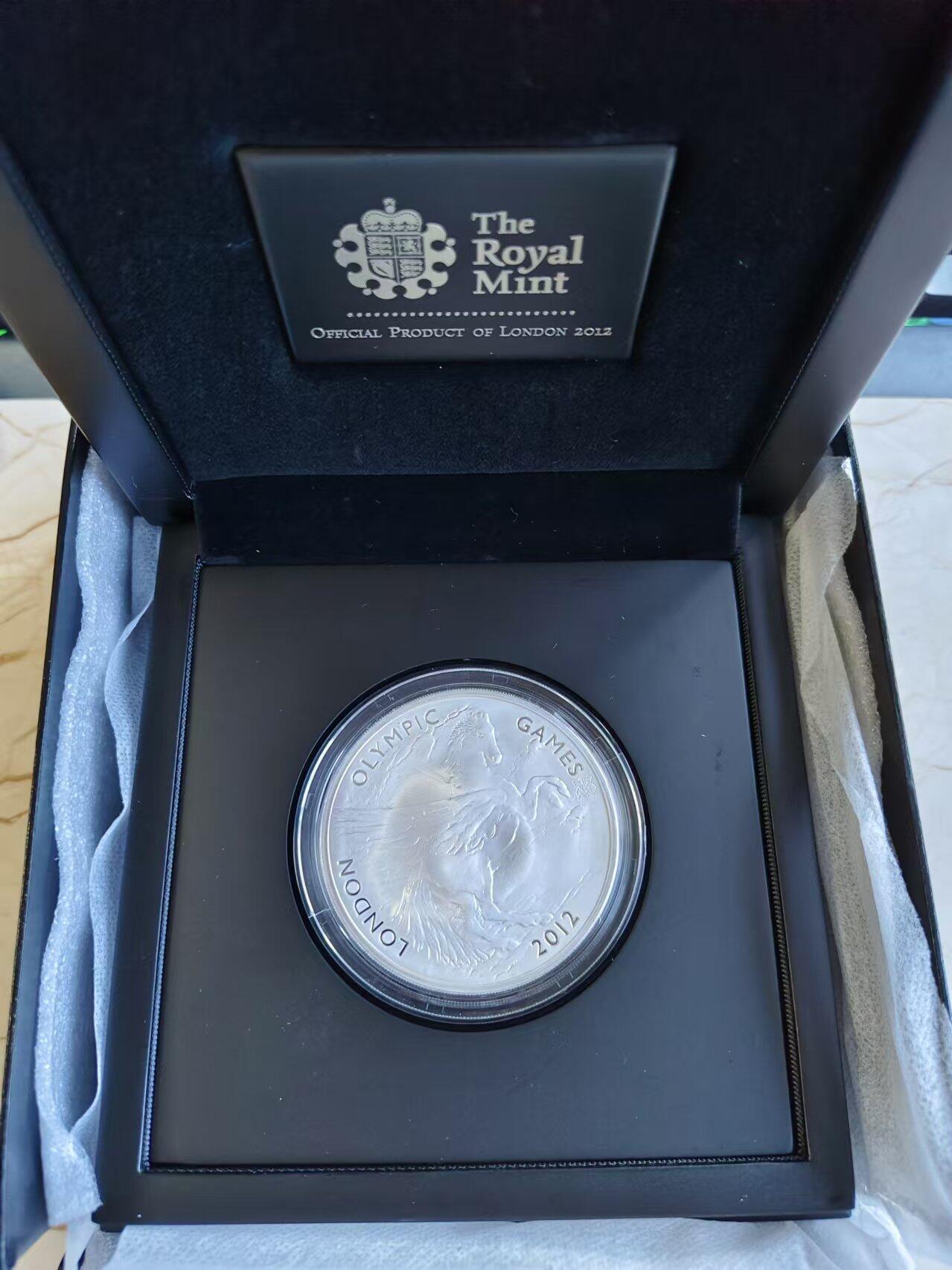 第187期拍卖 获奖币英国2012年伦敦奥运飞马精制纪念银币，荣获世界硬币大奖赛