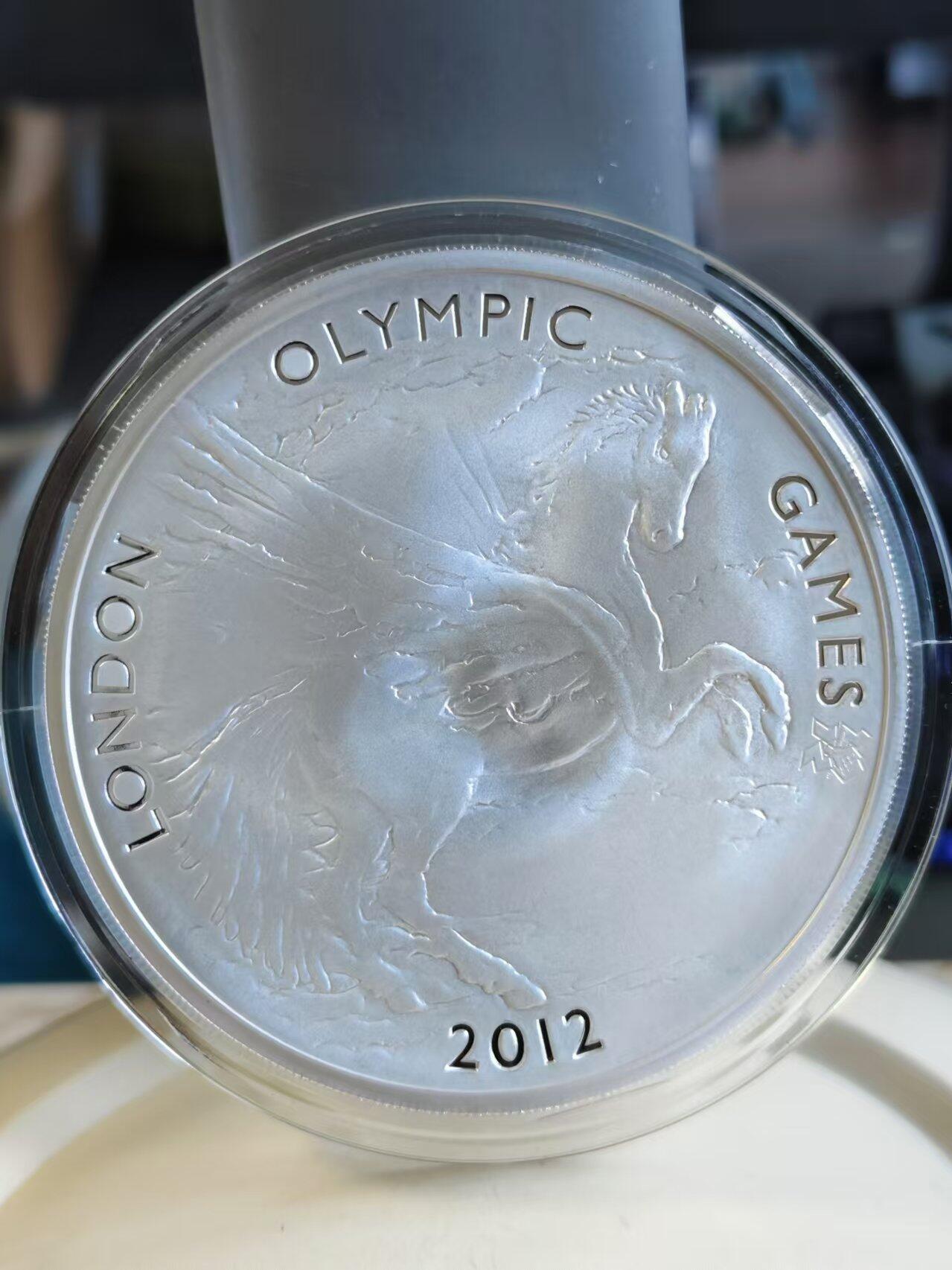 第187期拍卖 获奖币英国2012年伦敦奥运飞马精制纪念银币，荣获世界硬币大奖赛