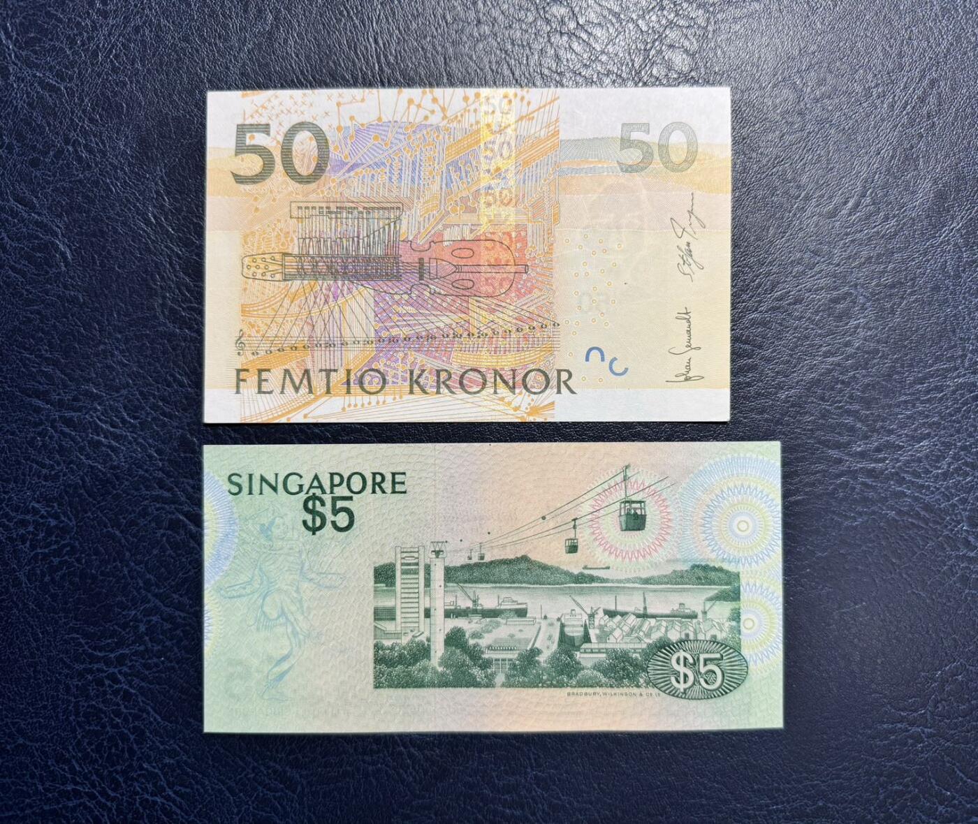 收藏联盟Quantum Auction 第375期拍卖  瑞典2011年50克朗和新加坡1976年版5元 品相为UNC-和AU