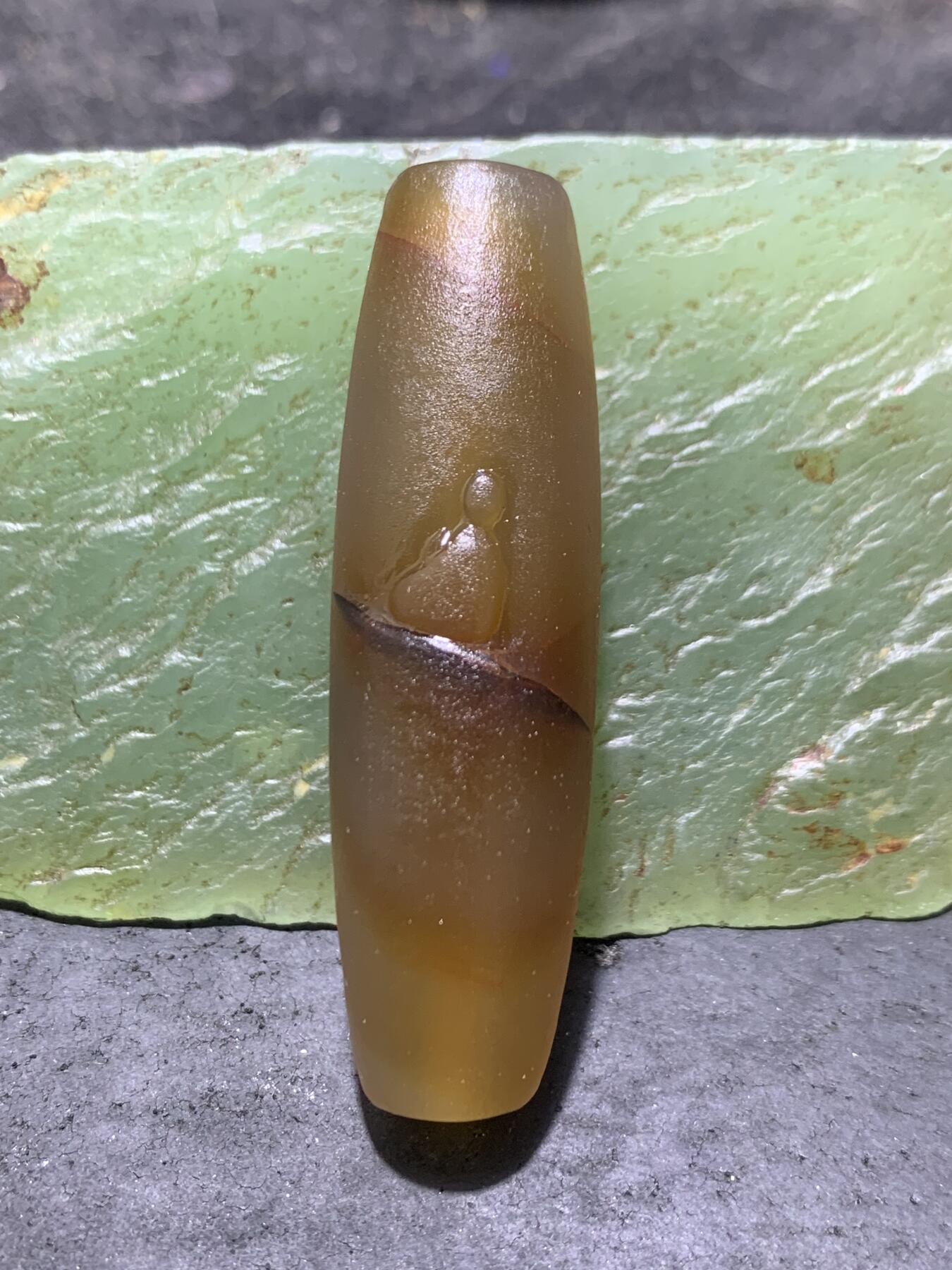 精美亚光高玉化巴西玛瑙手工俏色巧雕无相佛桶珠一个！